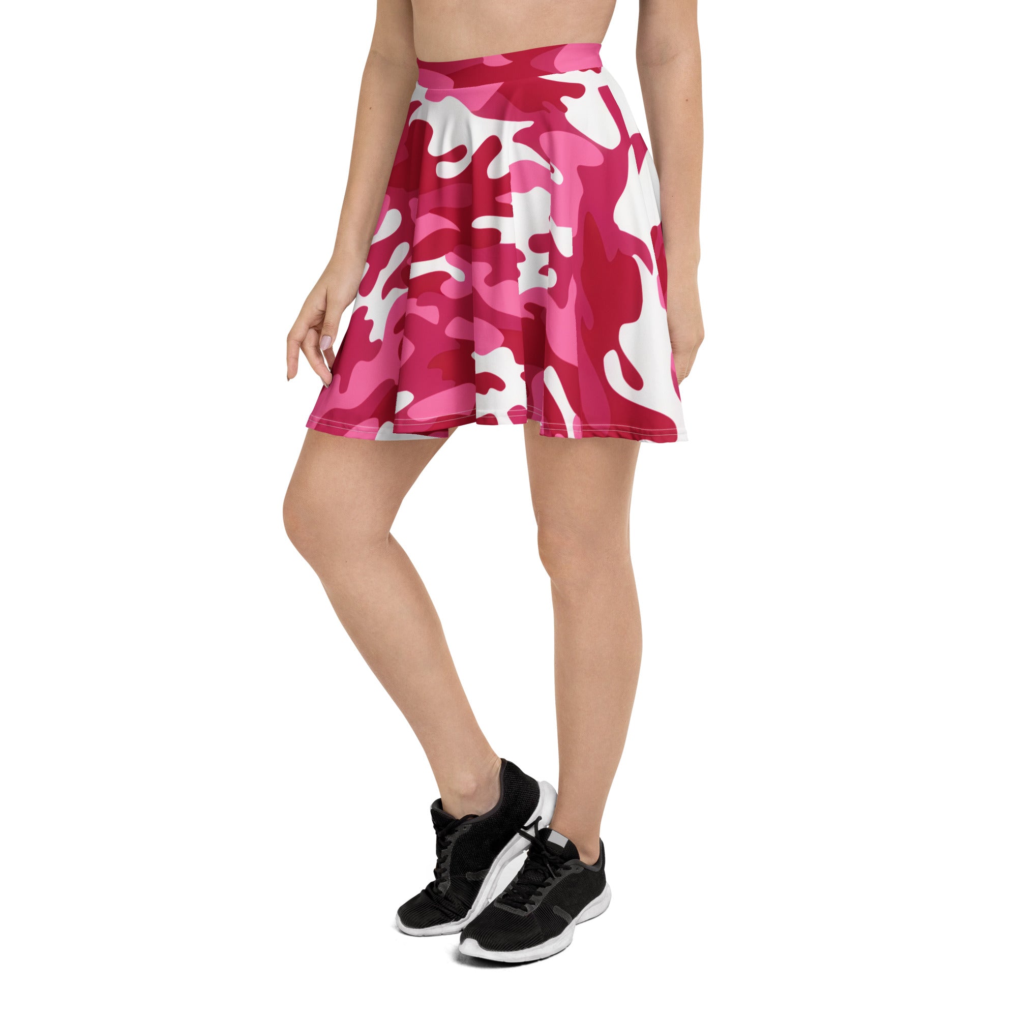 A women’s hot pink camouflage skater skirt with a vibrant pink and white pattern made from smooth stretchy fabric