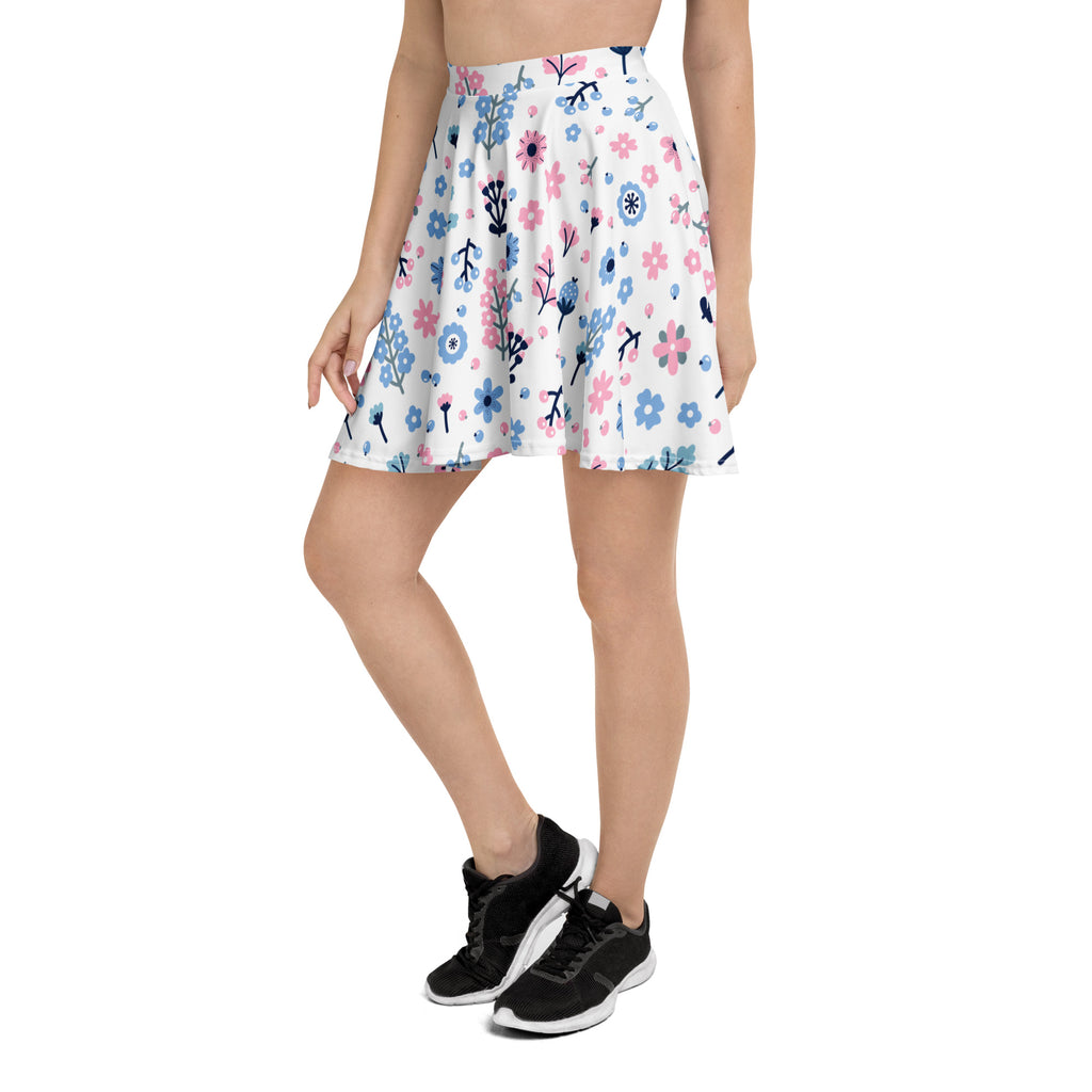 A white floral skater skirt with pink and blue flowers high waisted flowy with upf 50 plus recycled fabric