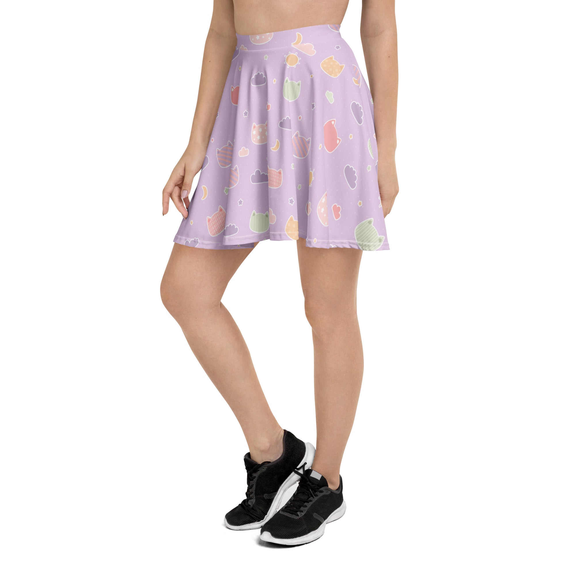 A lavender pleated skater skirt with pastel kawaii cats and clouds made from recycled fabric with UPF 50+ protection