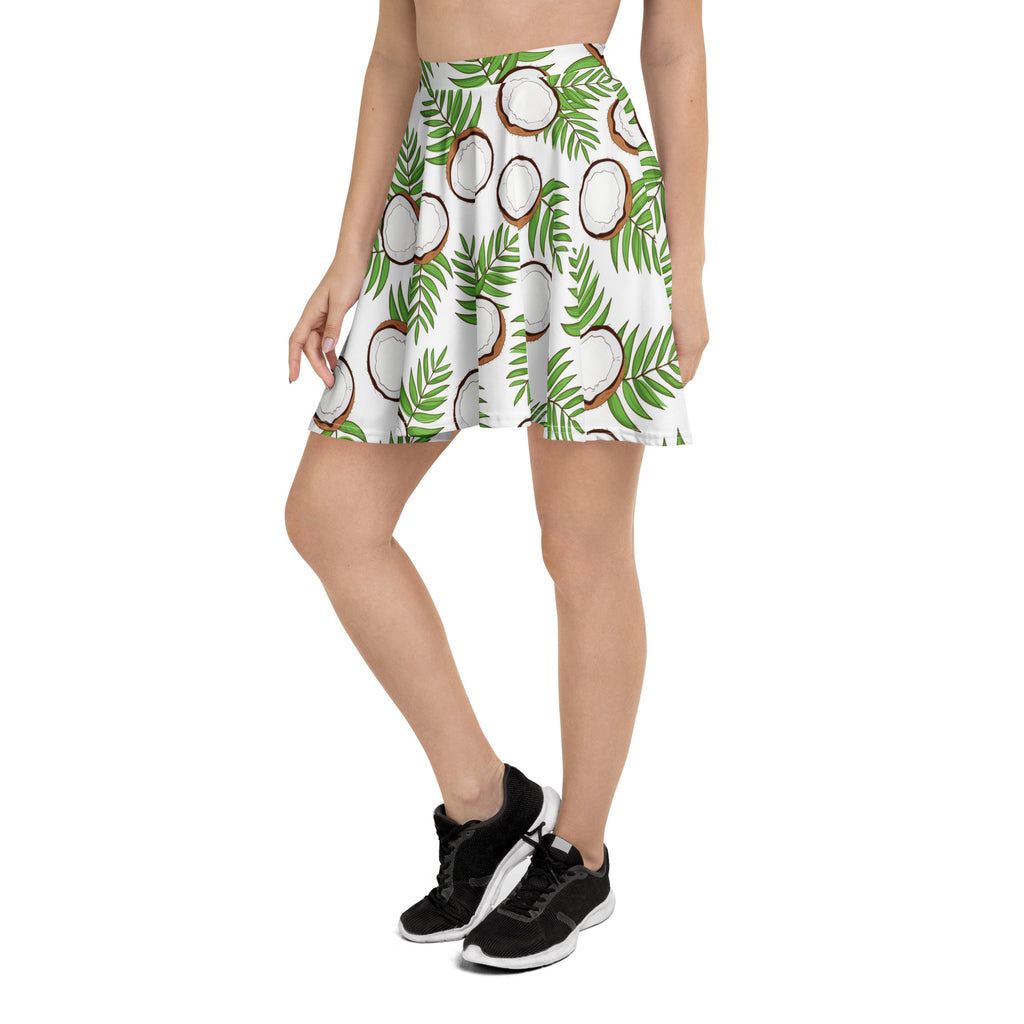 Women’s white flared skater skirt with green palm leaves and brown coconuts made from recycled fabric with upf 50+