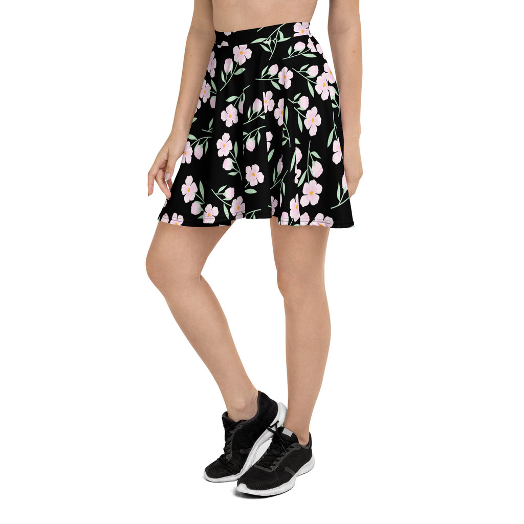 Women’s black floral skater skirt with pink flower pattern green leaves flowy high waisted recycled fabric upf 50+