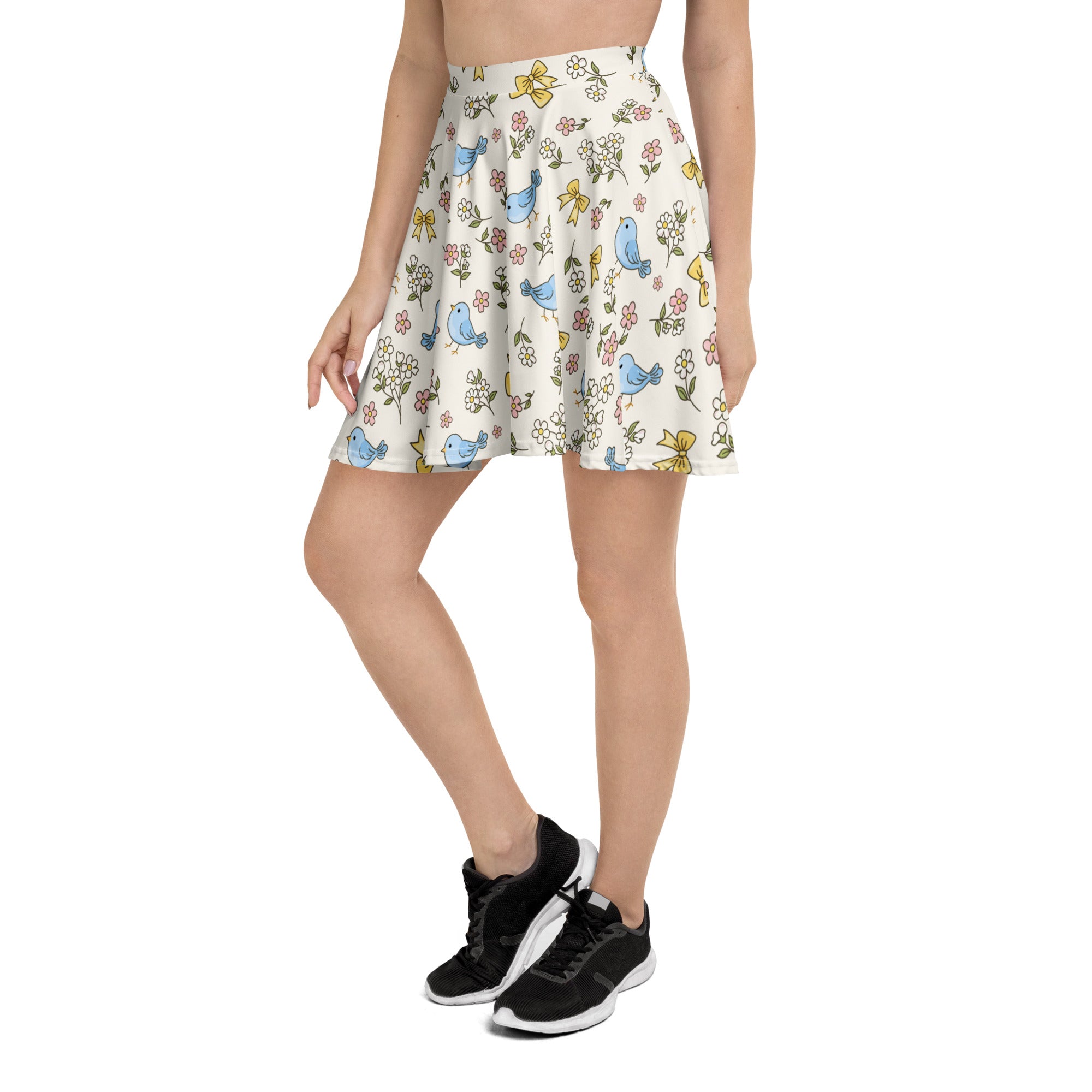 Women’s blue bird skater skirt with flared design flowy high waisted off-white recycled fabric with floral print