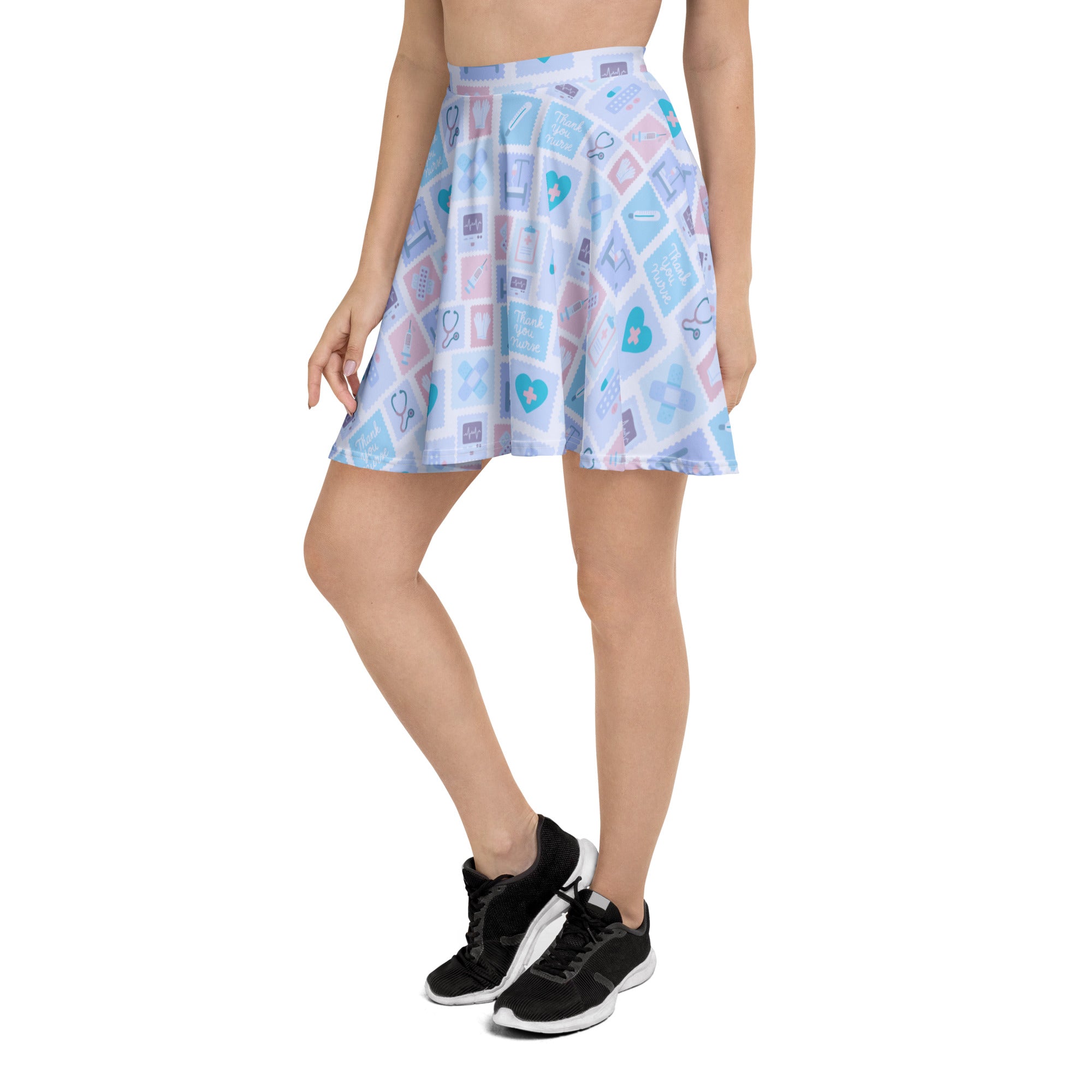 Women’s blue nurse icon skater skirt with light blue and pink medical pattern on sheer flowy high waisted fabric