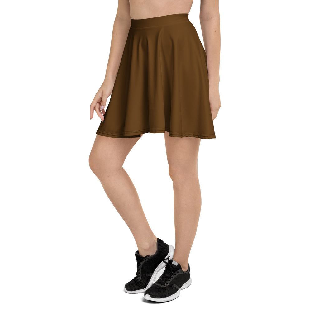 A flared brown pleated skater skirt with a high waistband made from recycled fabric with upf 50 plus protection