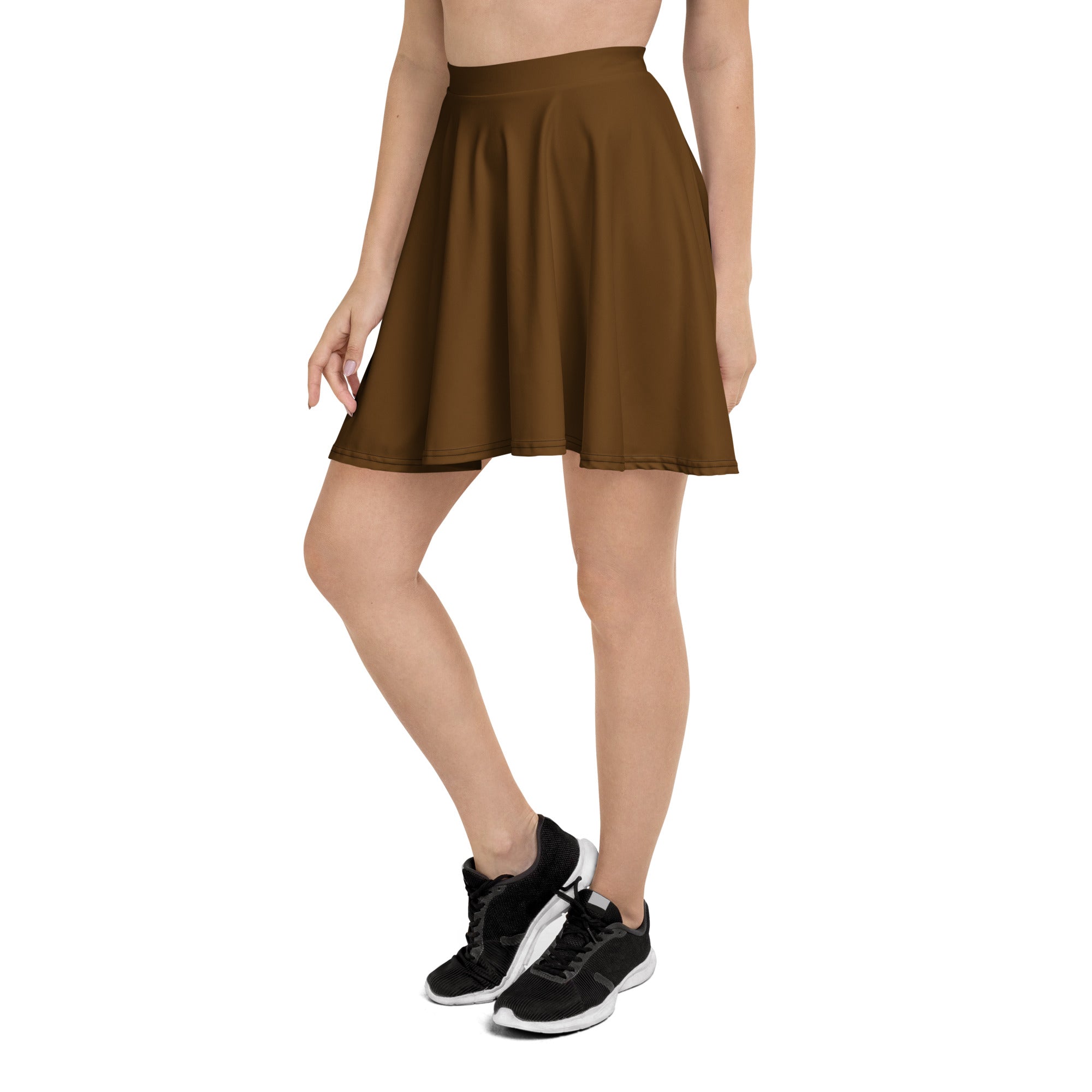 A flared brown pleated skater skirt with a high waistband made from recycled fabric with upf 50 plus protection