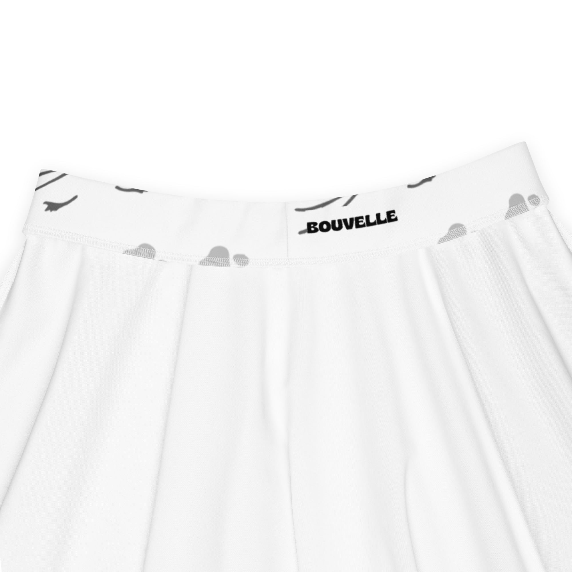 White pleated skater skirt with gray cloud and bird waistband featuring bouvelle brand name in recycled fabric