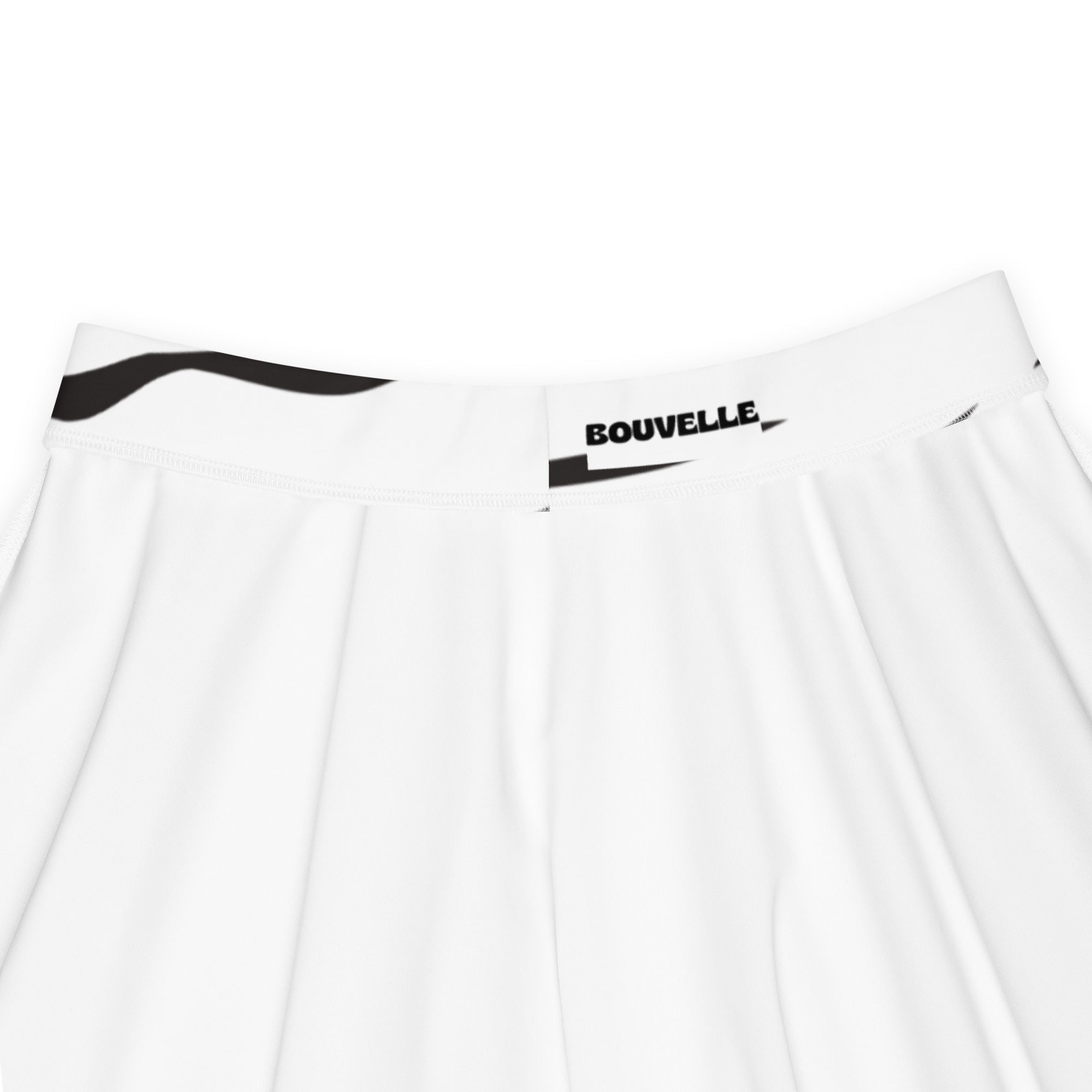 White pleated skater skirt with black bouvelle waistband featuring zebra print high waisted flowy design with upf 50+