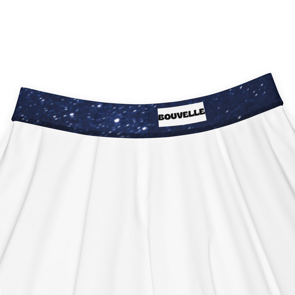 Women’s white galaxy skater skirt with navy starry waistband featuring bouvelle label made from recycled fabric with upf 50+