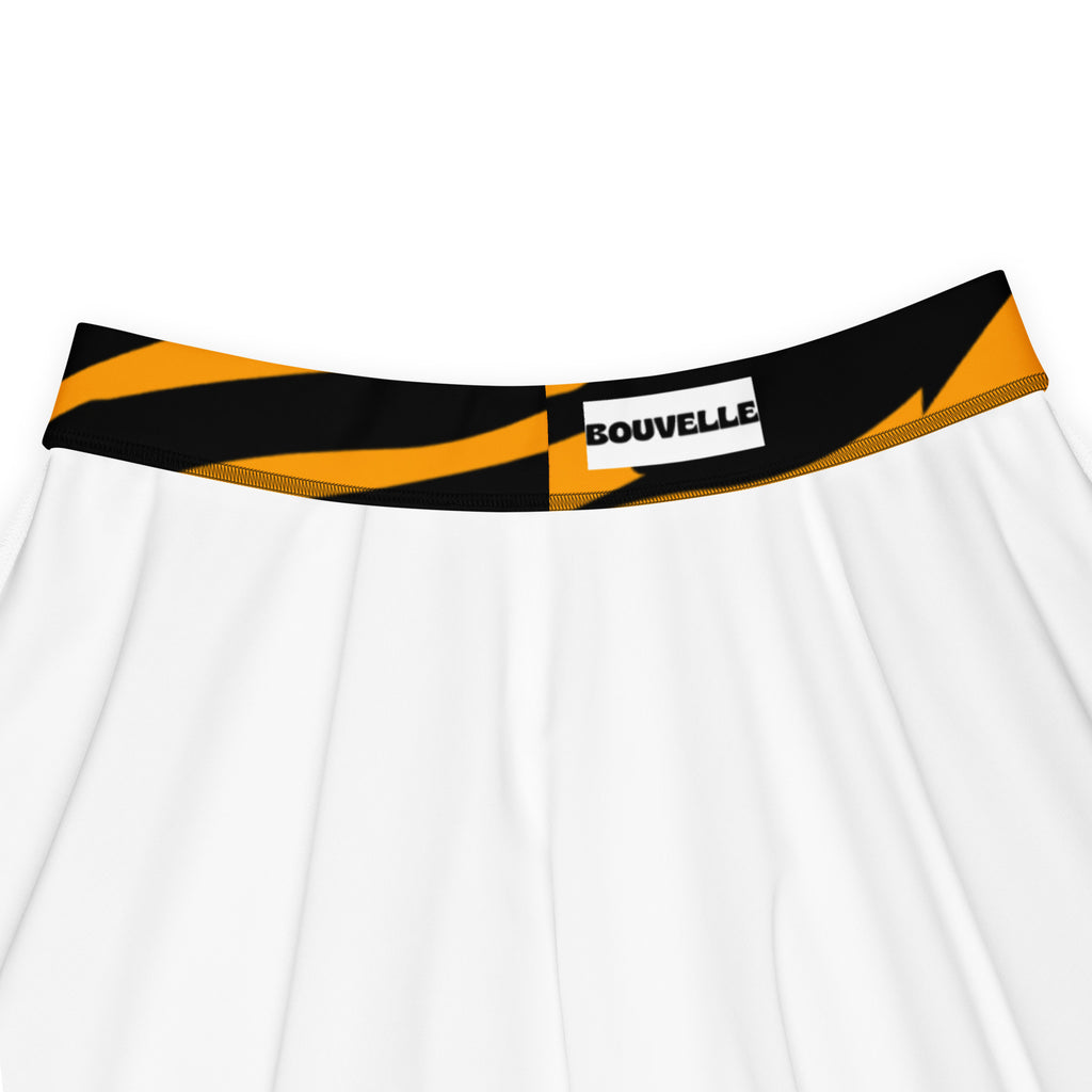 White women’s underwear with black and orange tiger stripe waistband and bouvelle brand label in recycled fabric