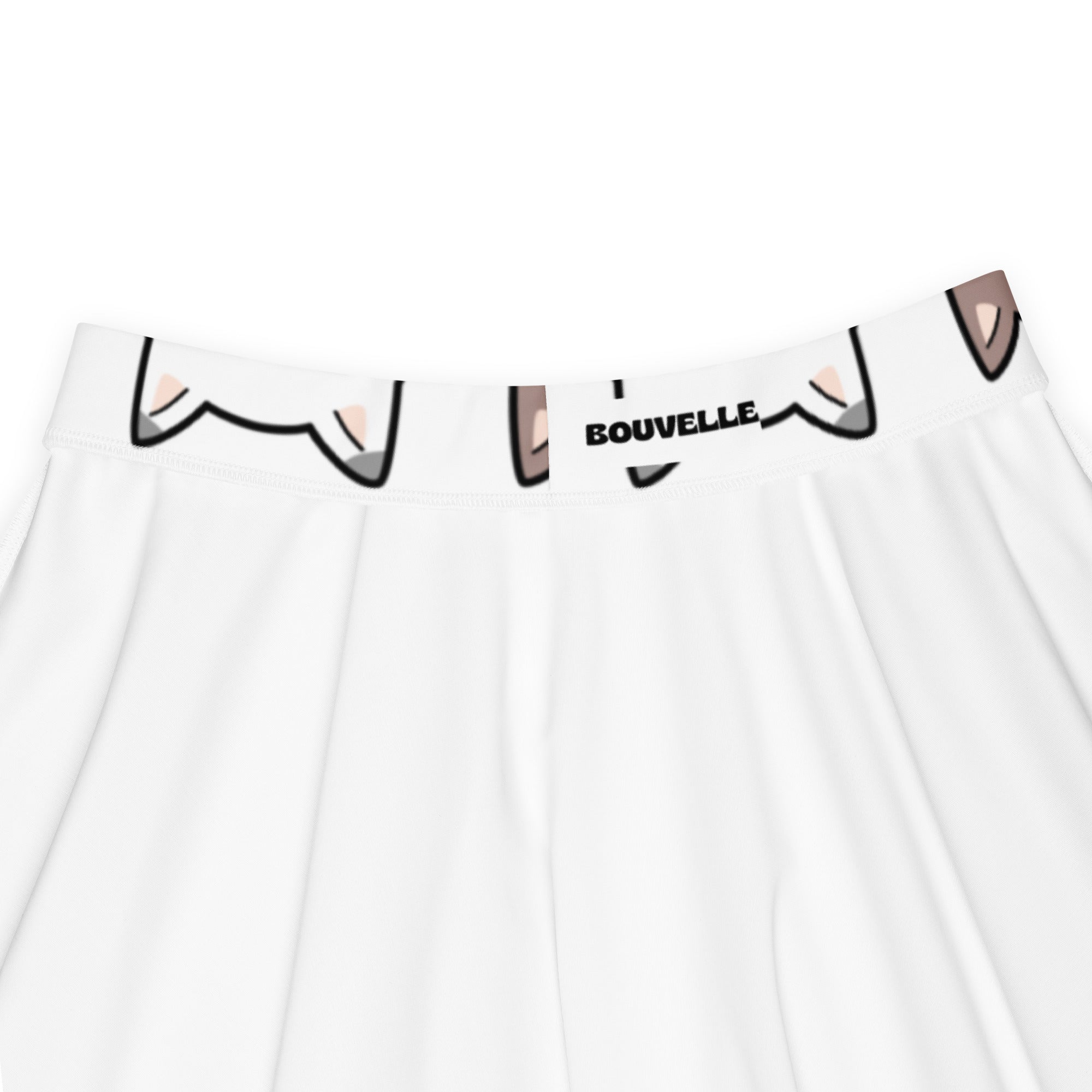 White pleated skater skirt with playful cartoon cat ear waistband detail and bouvelle branding made from recycled fabric