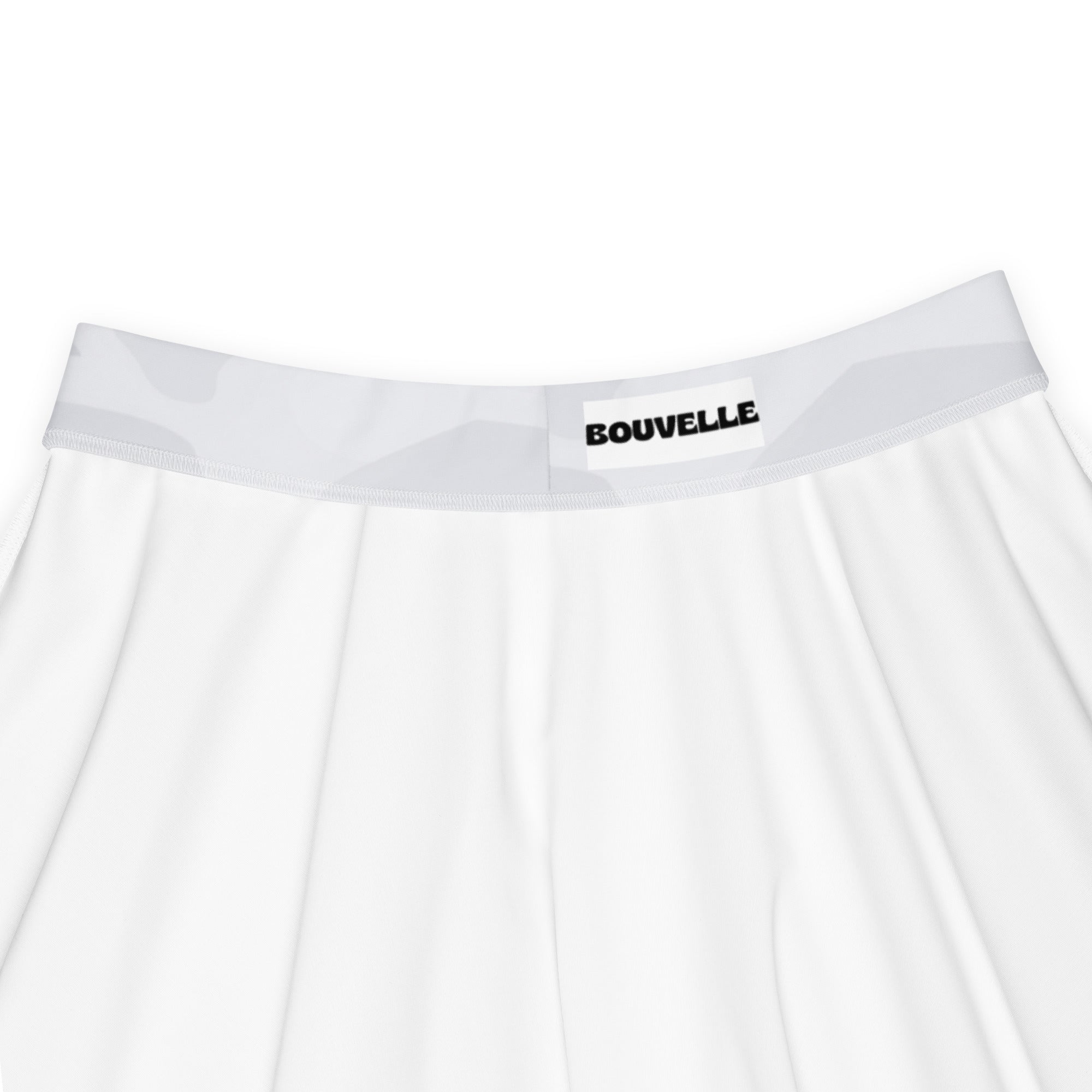 Women’s light gray skater skirt with flowy high waist and upf 50 plus made from recycled fabric paired with white bouvelle branded underwear with gray geometric elastic waistband