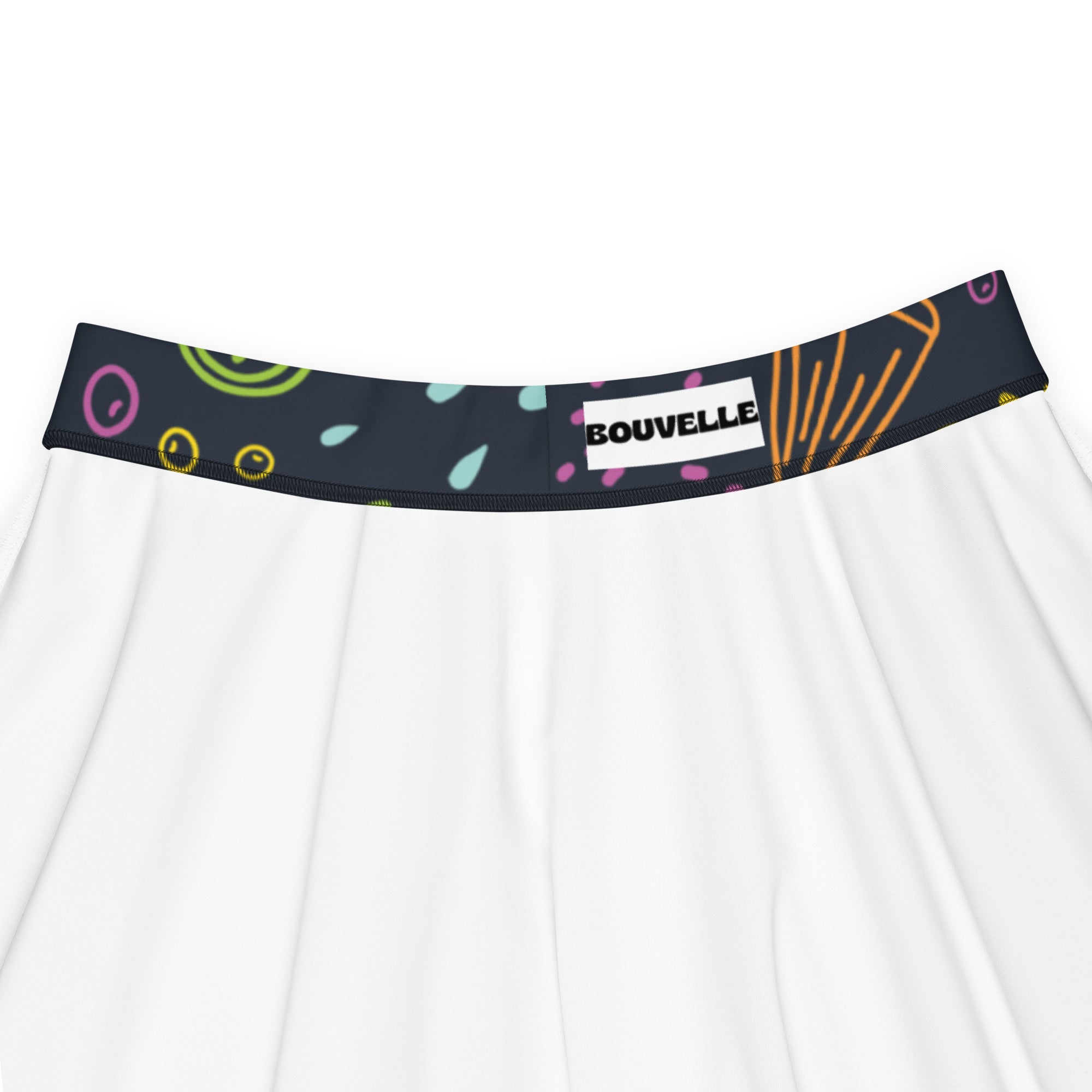 White pleated women’s neon fruit skater skirt with dark blue elastic waistband colorful abstract patterns bouvelle label