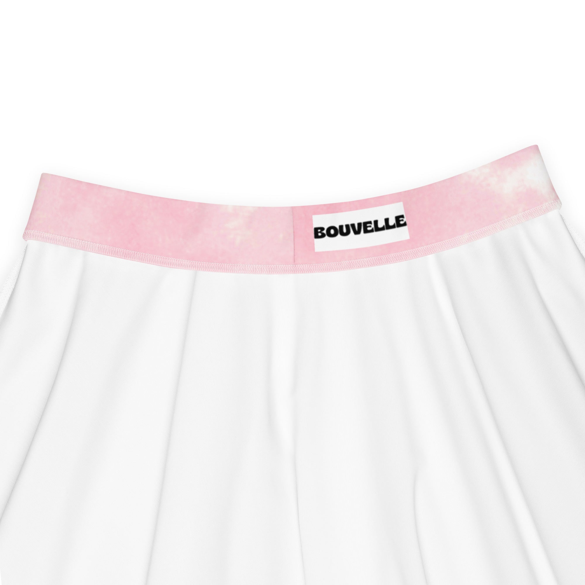 White pleated womens skater skirt with pink tie dye waistband and bouvelle label made from recycled fabric with upf 50+