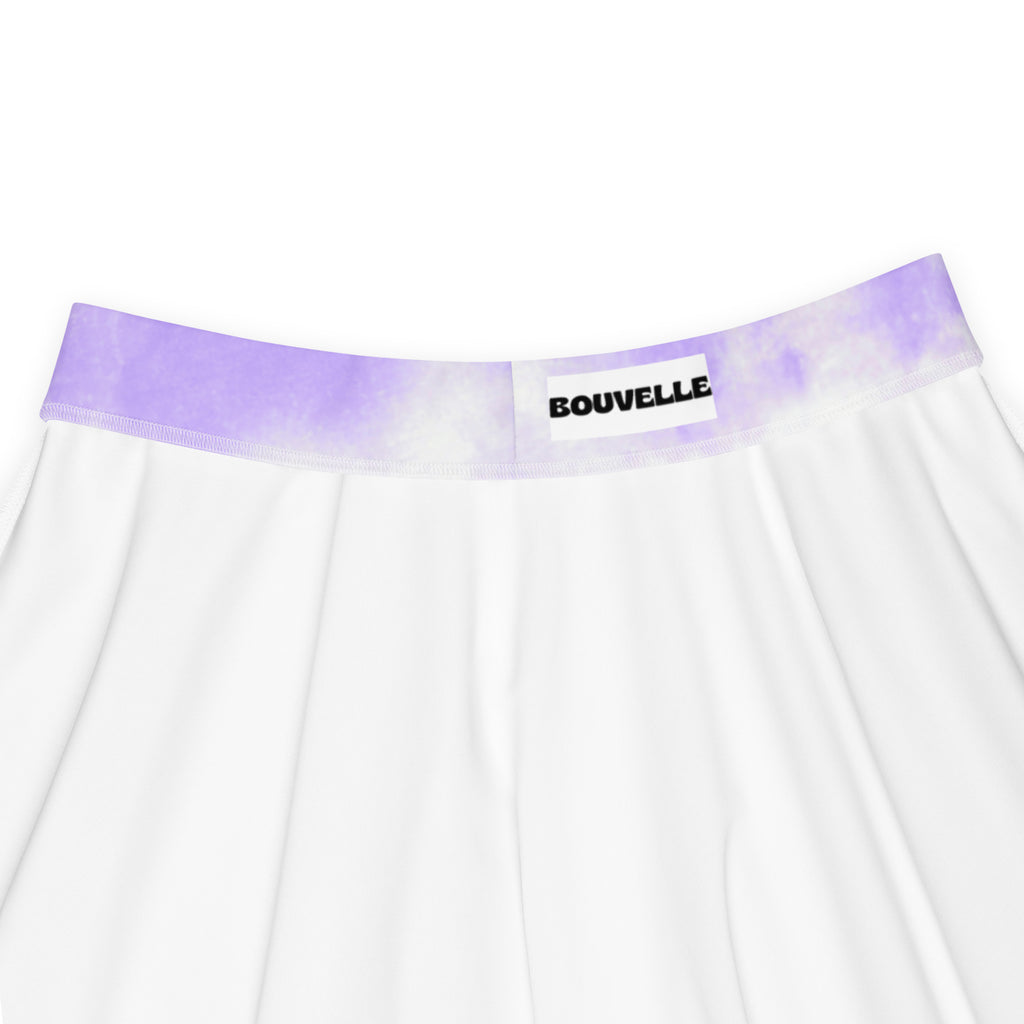 White pleated skater skirt with lavender tie dye waistband and bouvelle label made from recycled fabric with UPF 50+