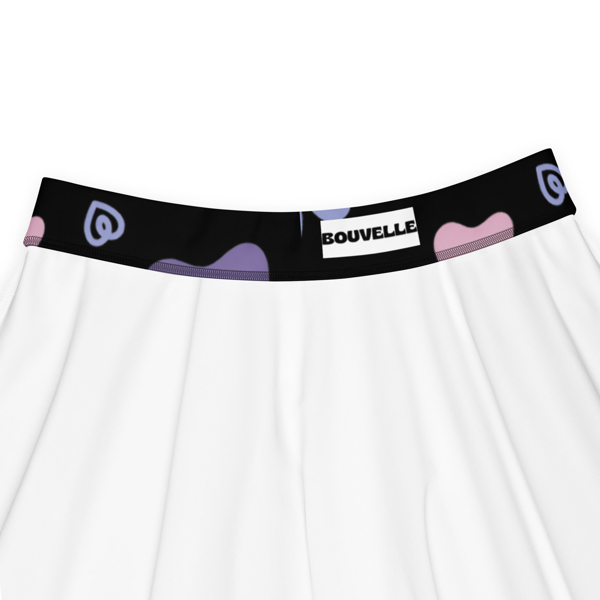 White skater skirt with black waistband and pink purple heart patterns by Bouvelle made from recycled fabric with UPF 50+