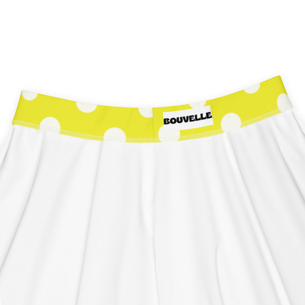 White skater skirt with bright yellow polka dot waistband by bouvelle made from recycled fabric with upf 50+