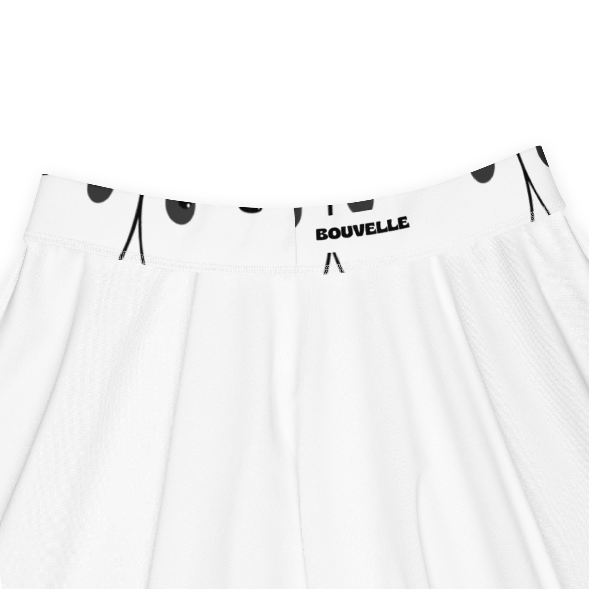 White pleated skater skirt with black panda face print and bouvelle branded waistband made from recycled fabric
