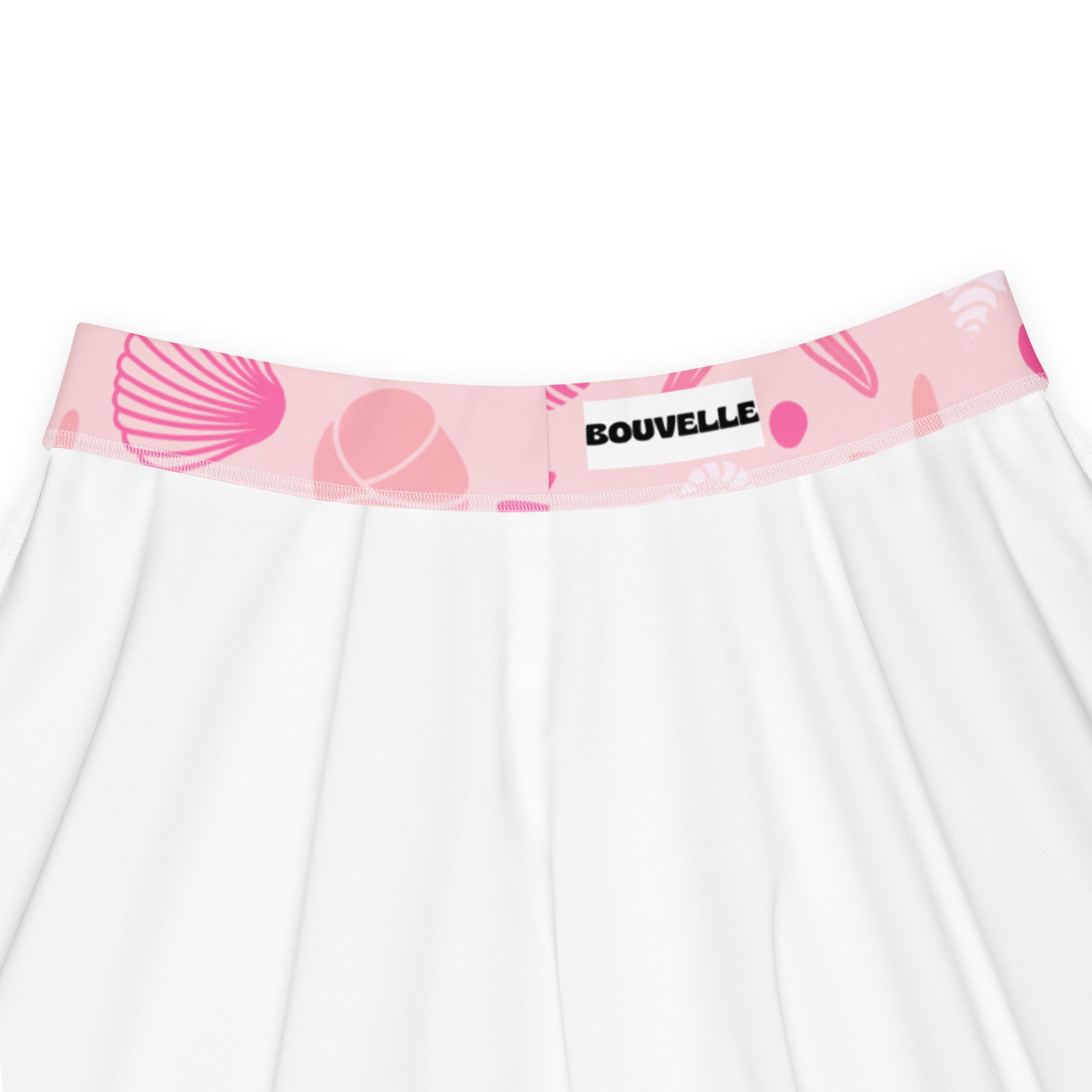 White skater skirt with pink shell patterned waistband branded bouvelle made from recycled fabric with upf 50+