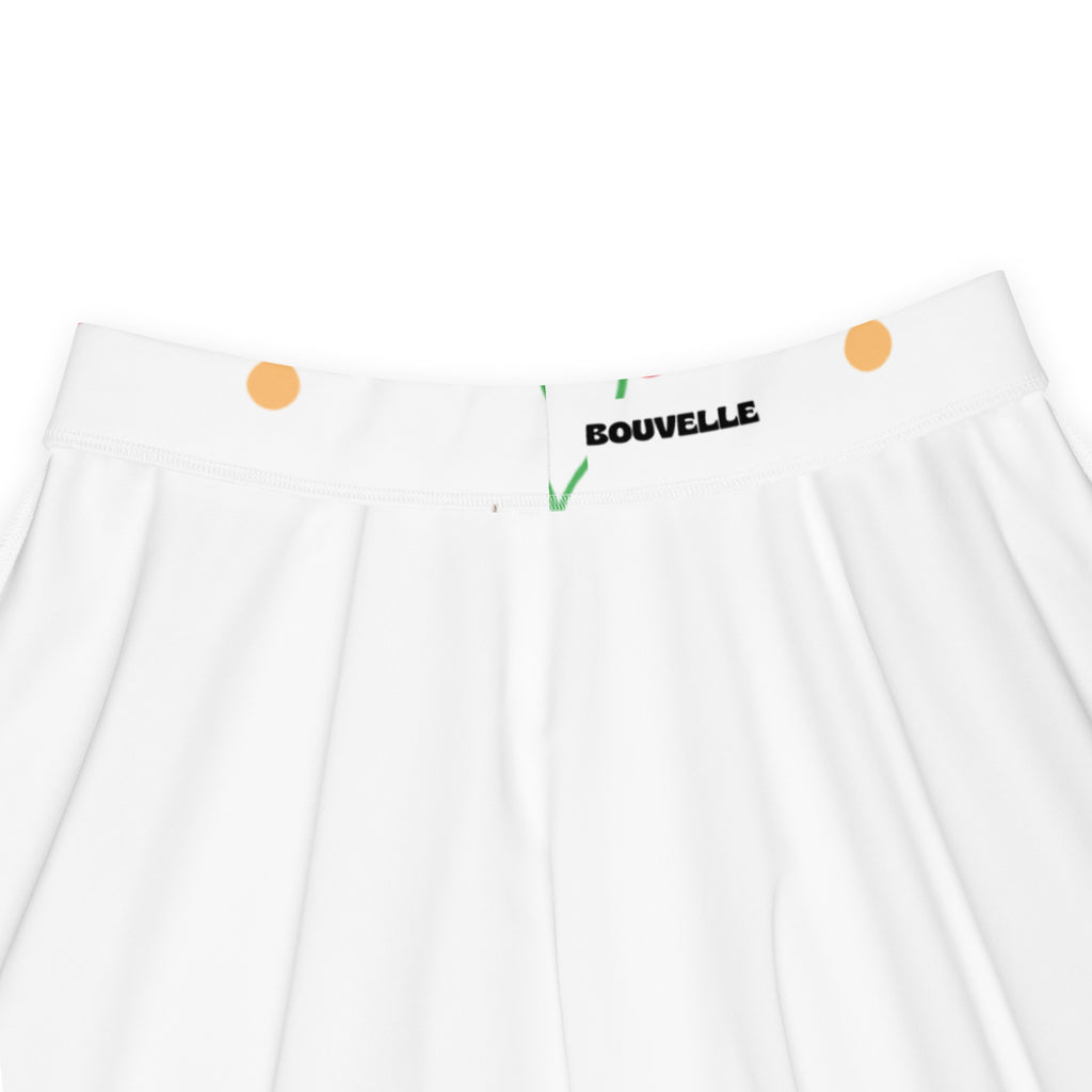 White pleated women cherry skater skirt with orange button closures, black bouvelle label, flowy high waisted, recycled fabric