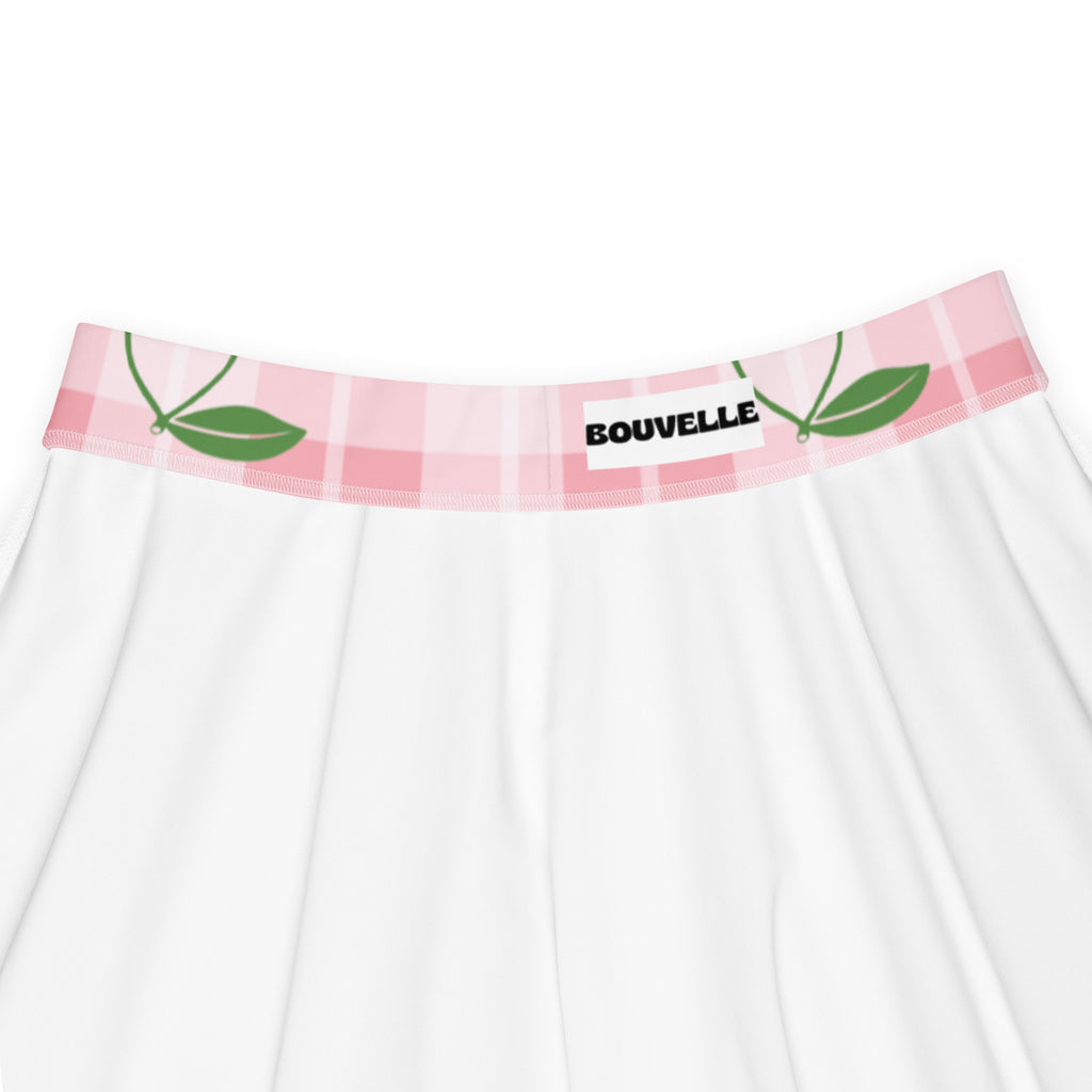 White underwear with pink and white plaid waistband featuring green leaf designs and bouvelle brand label