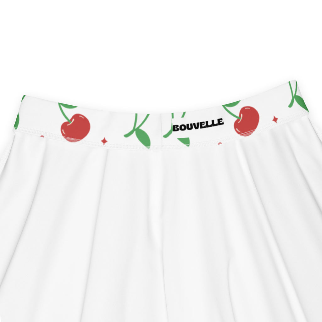 Women’s white cherry skater skirt with playful pattern flowy high waisted upf 50 plus recycled fabric and bouvelle logo