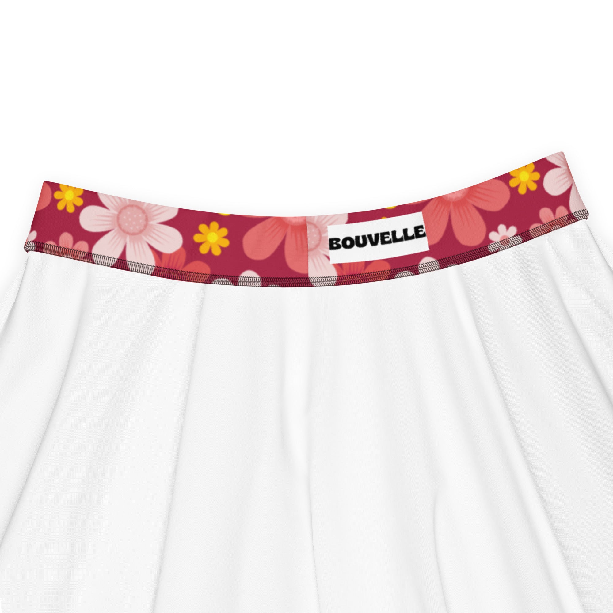 White floral-patterned underwear with red waistband featuring pink and yellow flowers branded bouvelle