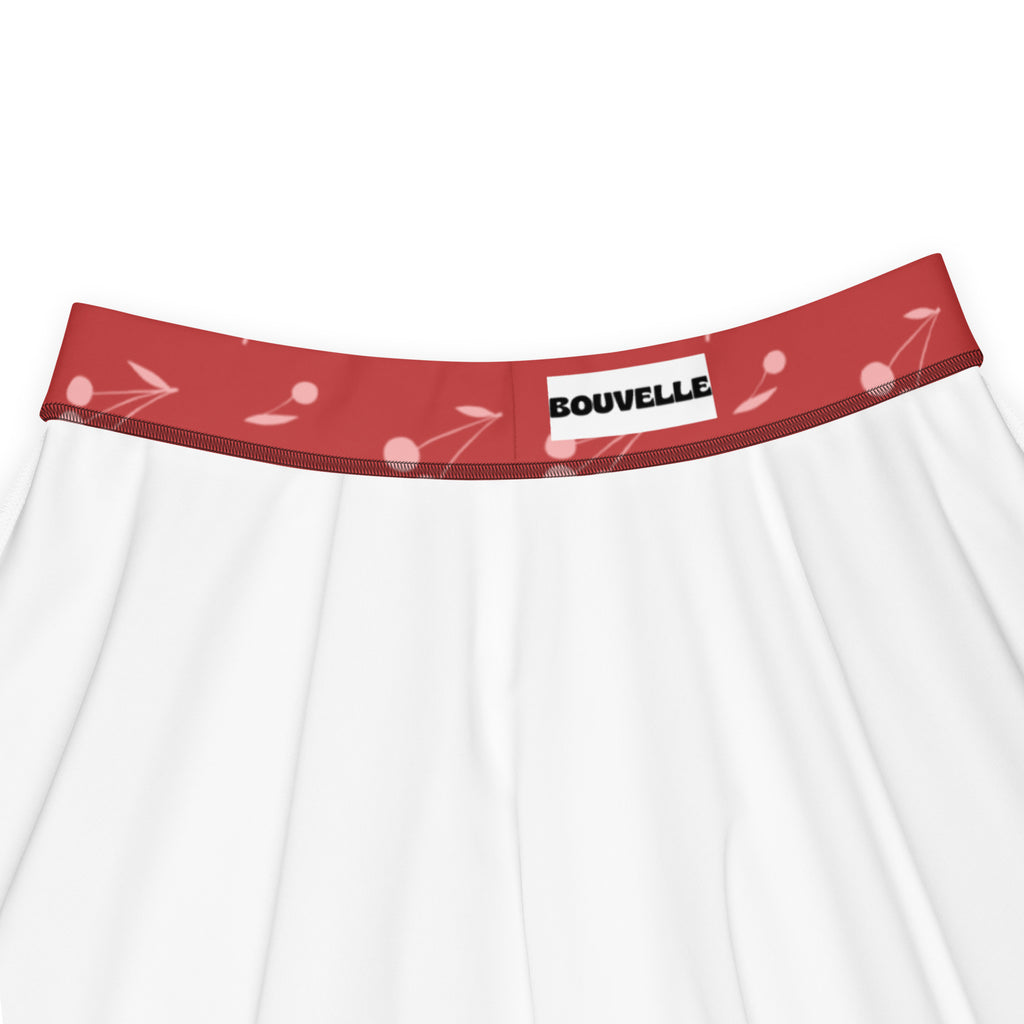 White underwear with red cherry patterned waistband and bouvelle label under women’s minimal cherry skater skirt product