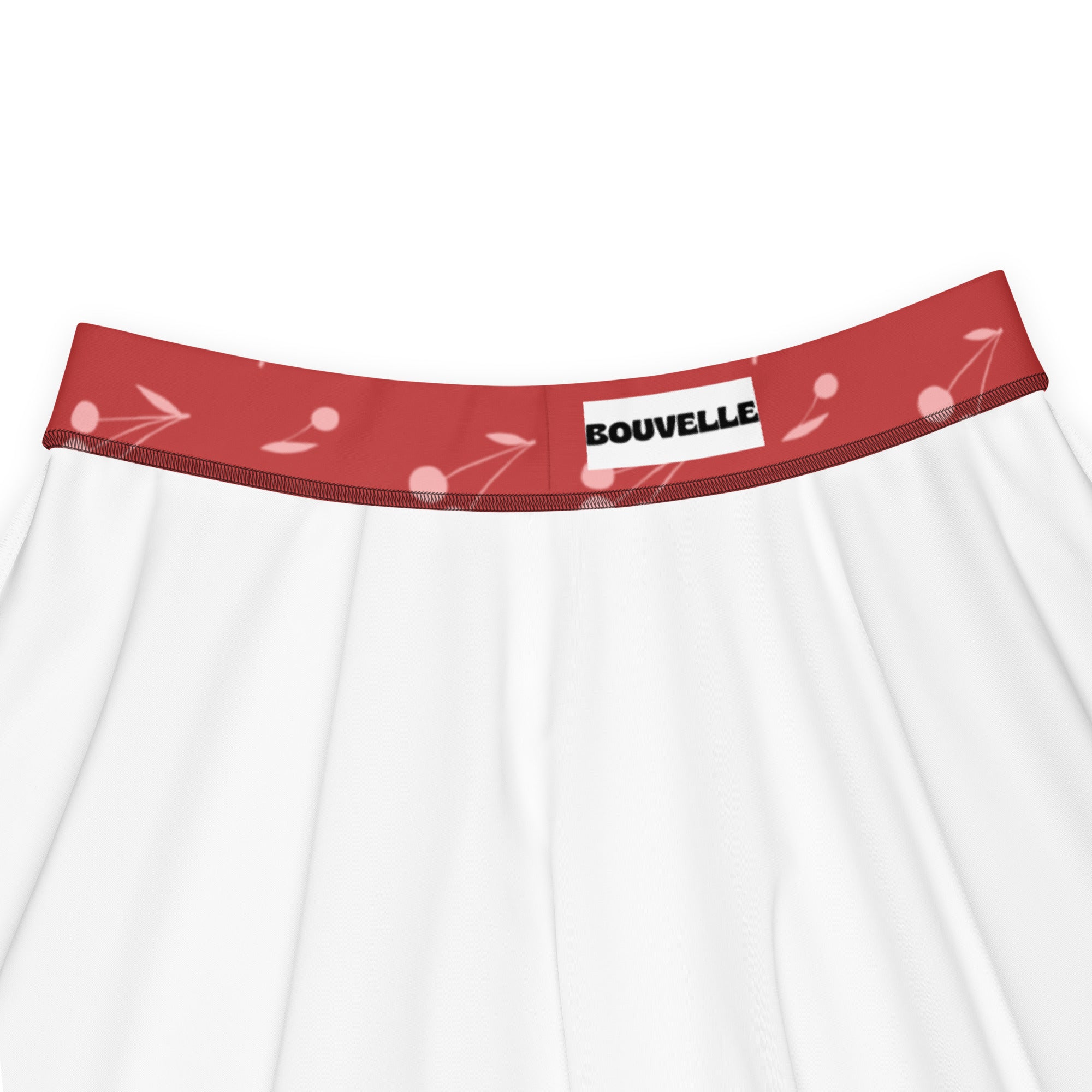 White underwear with red cherry patterned waistband and bouvelle label under women’s minimal cherry skater skirt product
