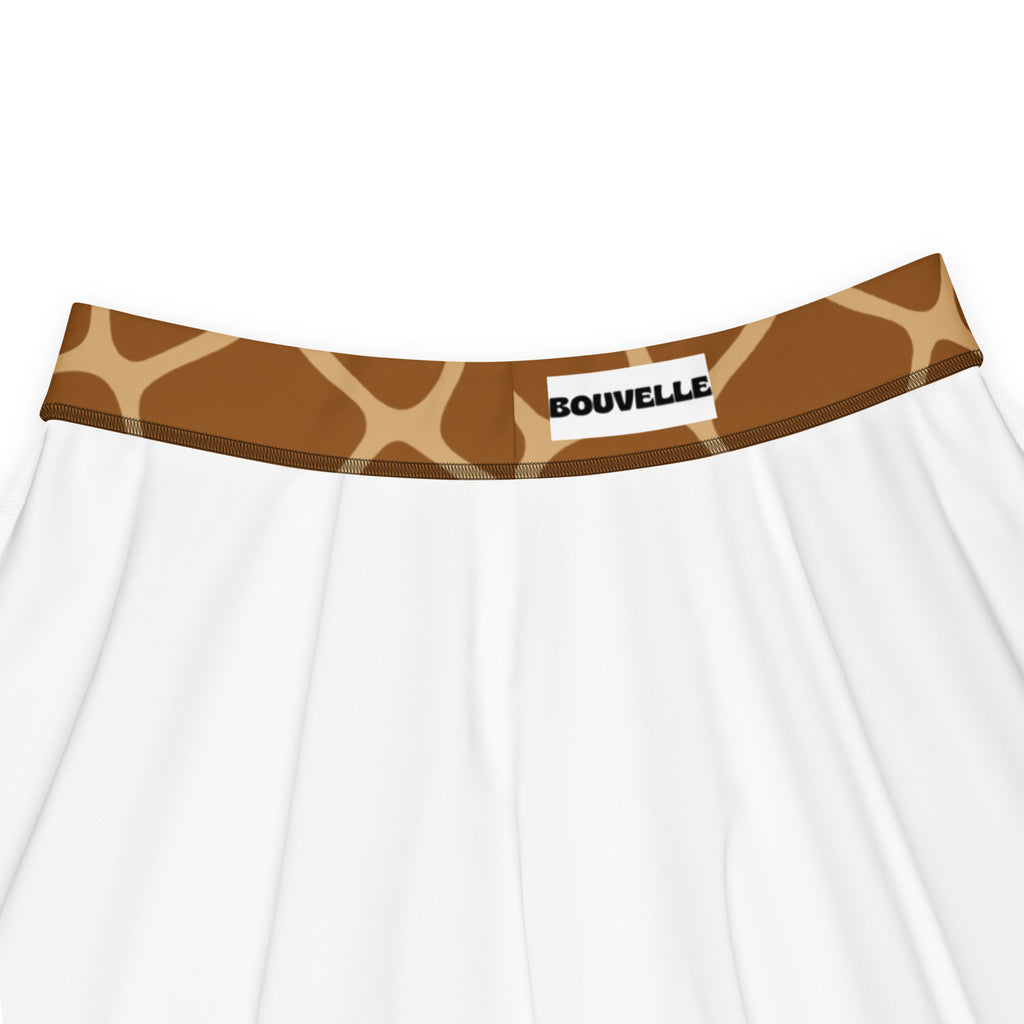 White women’s giraffe print skater skirt with brown waistband branded bouvelle flowy high waisted upf 50 recycled fabric