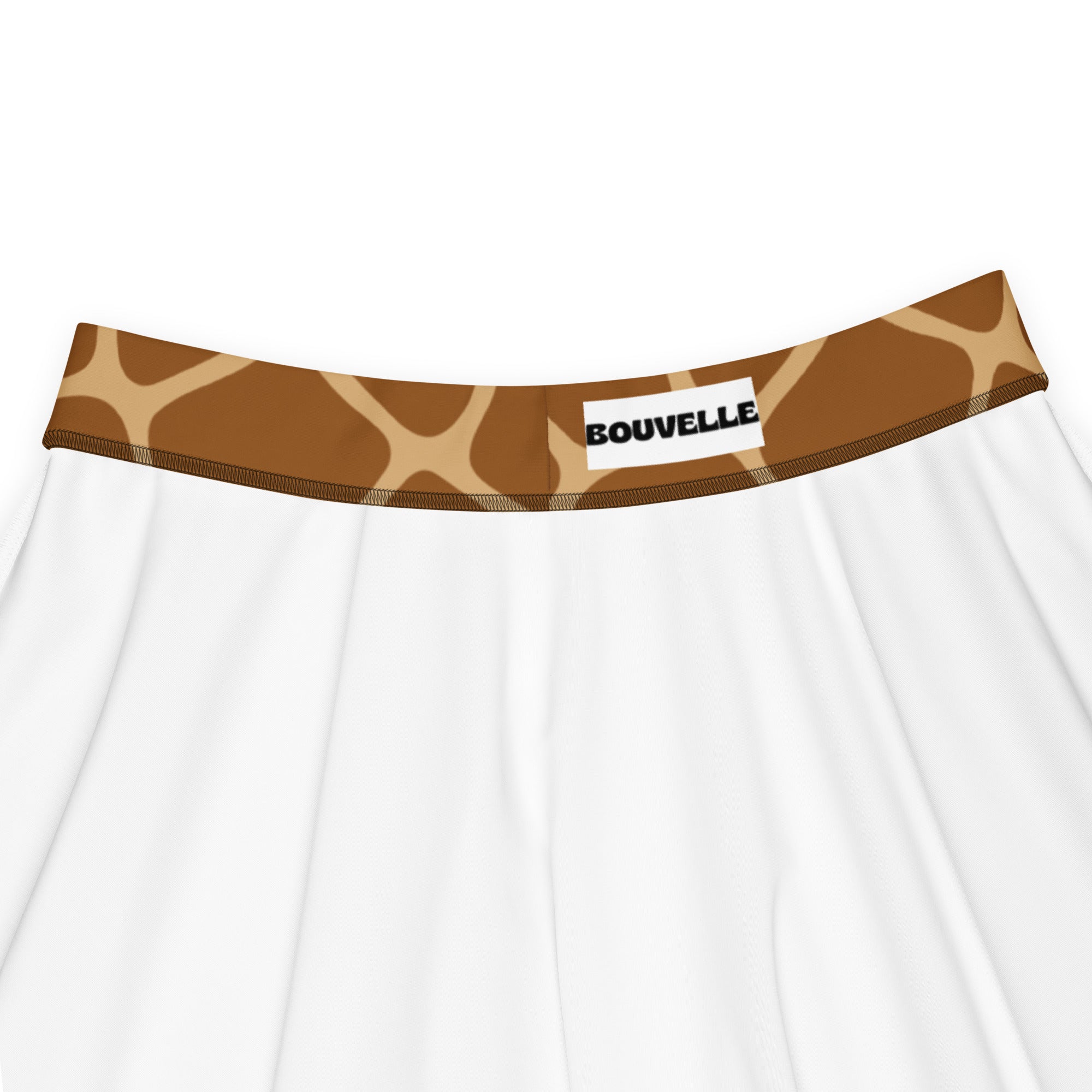 White women’s giraffe print skater skirt with brown waistband branded bouvelle flowy high waisted upf 50 recycled fabric