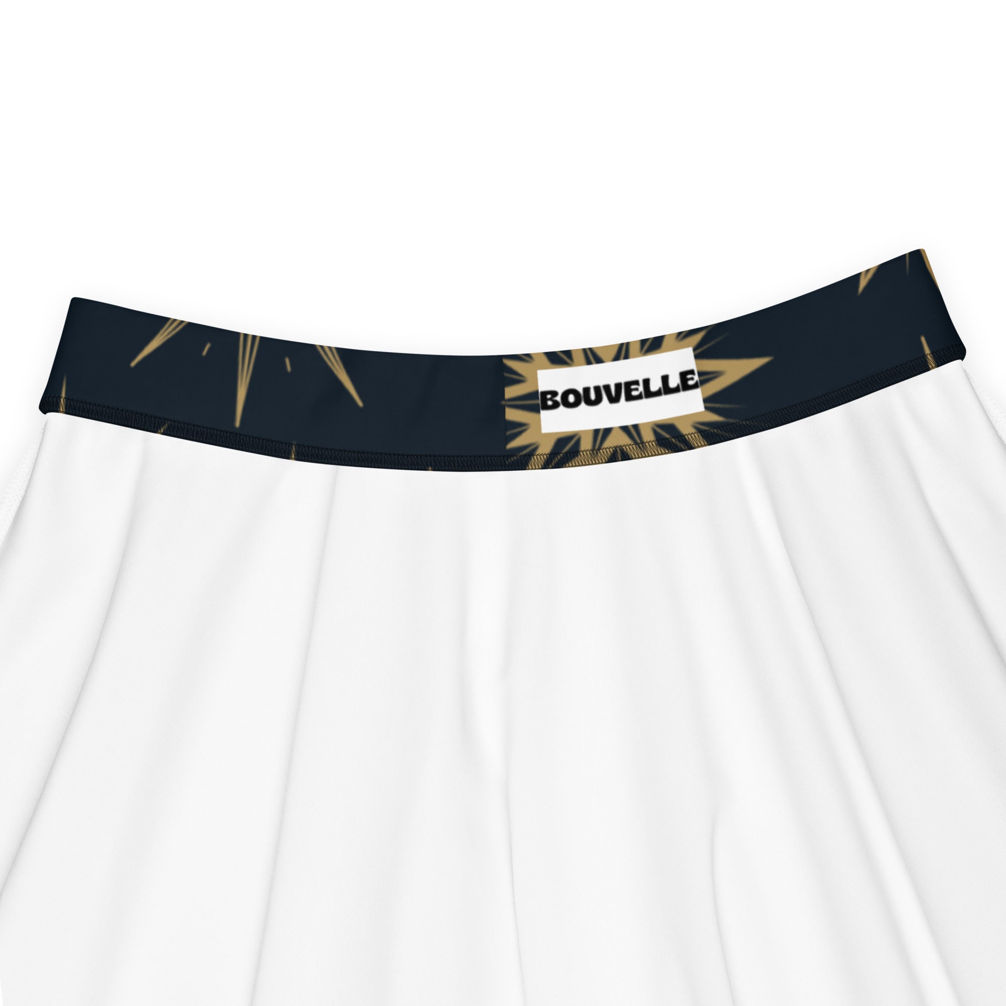White women’s underwear with navy blue waistband gold starburst patterns and bouvelle label in celestial design