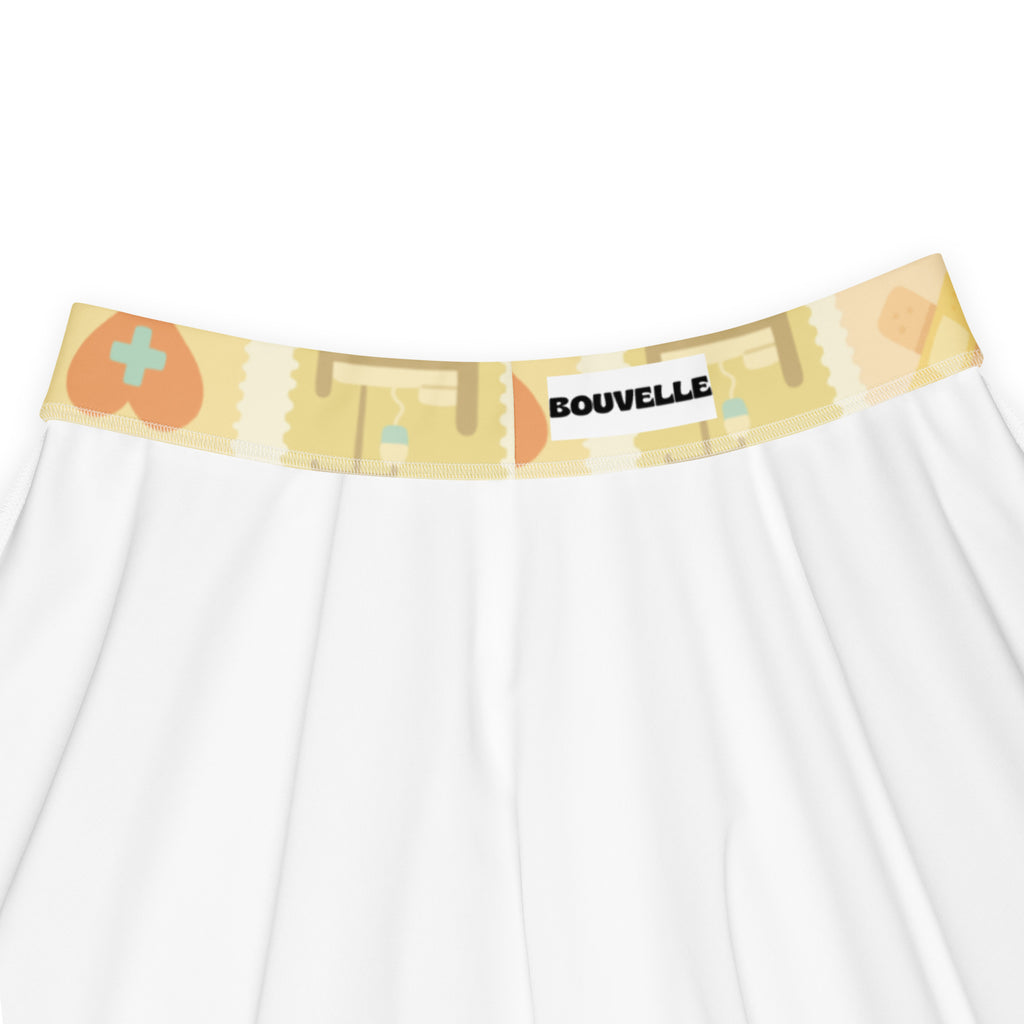 White women’s underwear with yellow waistband orange heart beige pattern by bouvelle paired with yellow nurse icon skater skirt