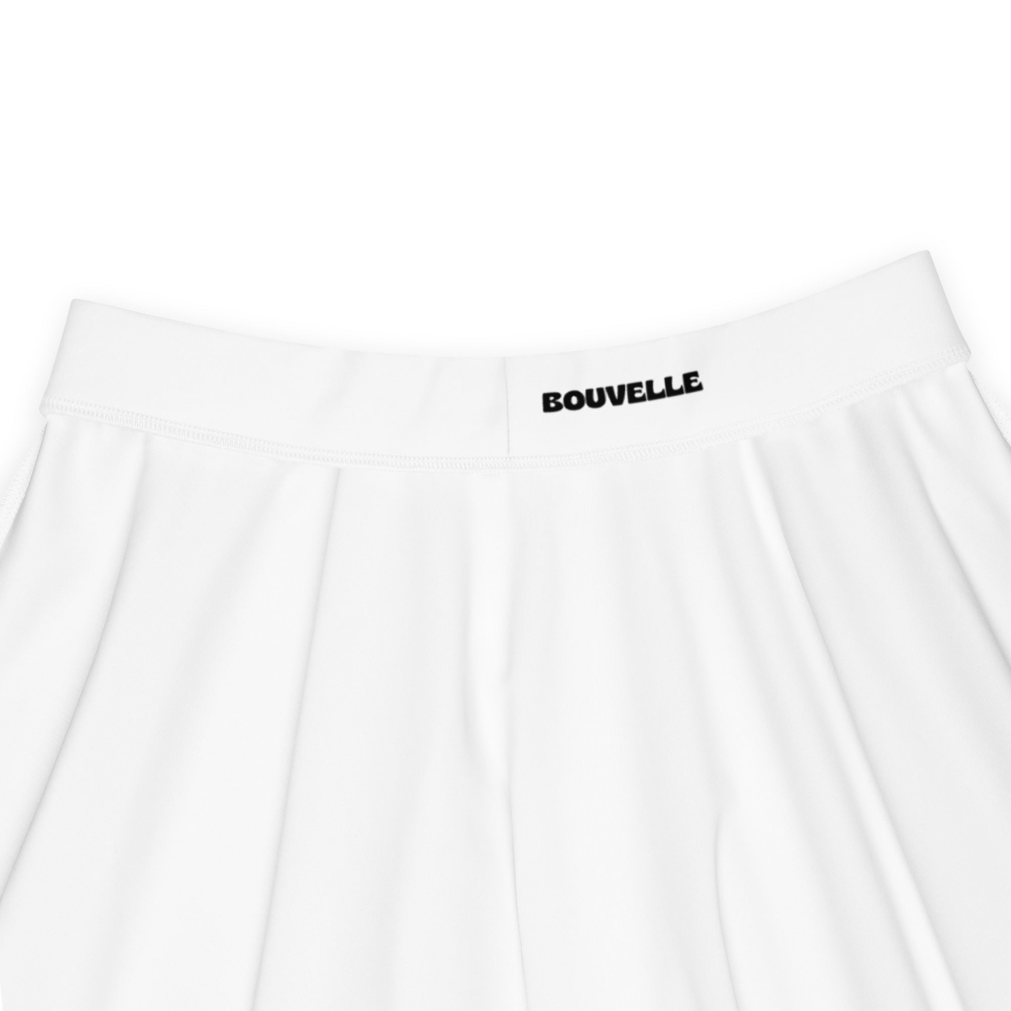 White pleated skater skirt with black bouvelle brand label high waisted flowy recycled fabric upf 50+