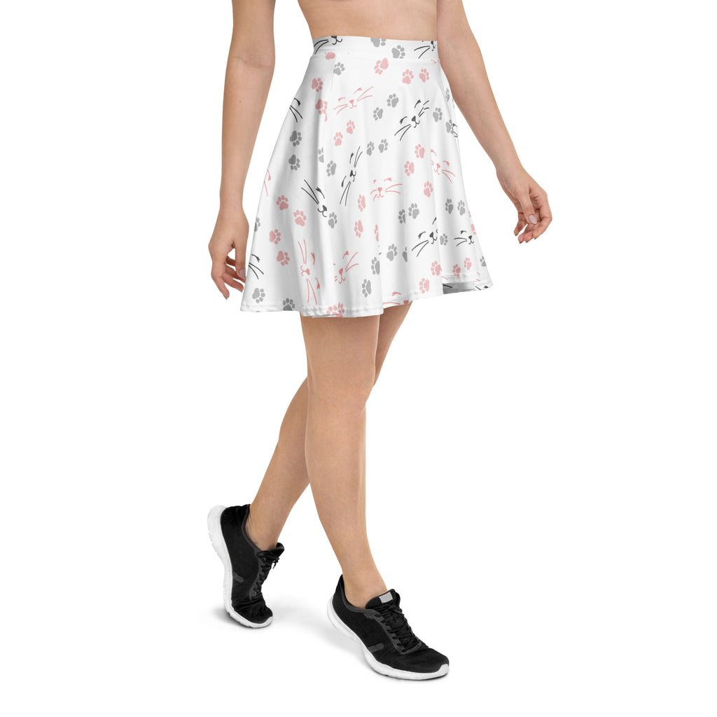 White flared skater skirt with pink and gray cat faces and paw prints made from recycled fabric with upf 50 plus