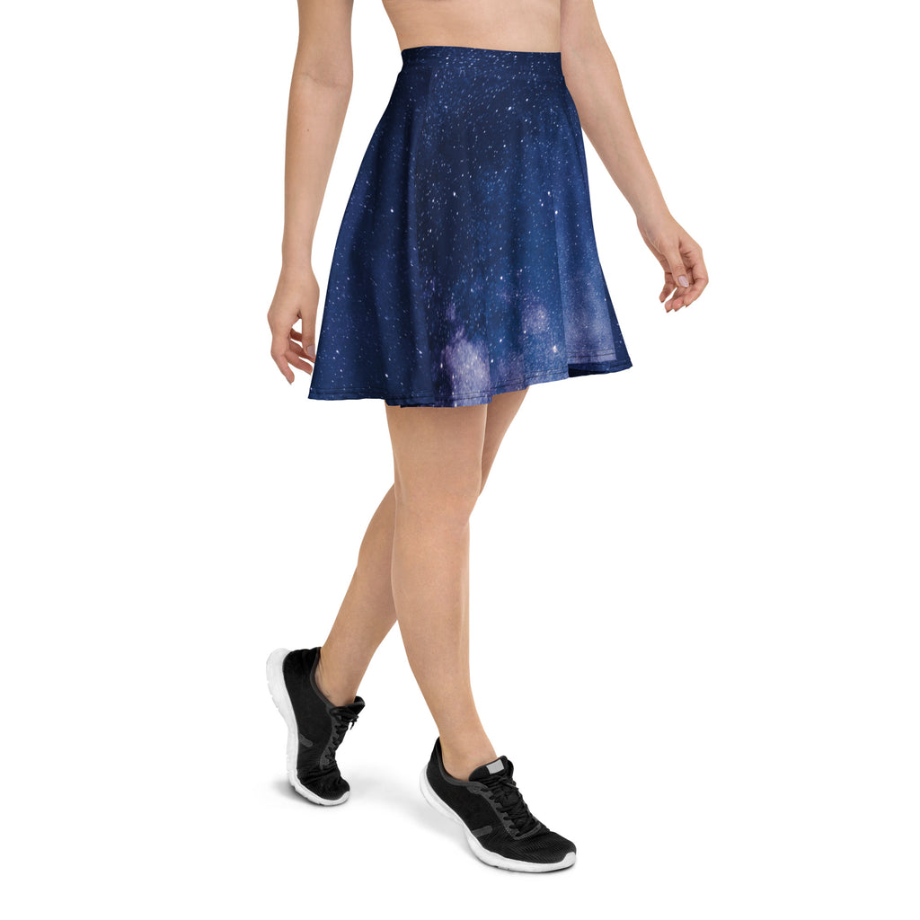 A navy blue women’s realistic galaxy skater skirt with cosmic print flowy high waisted recycled fabric and UPF 50+