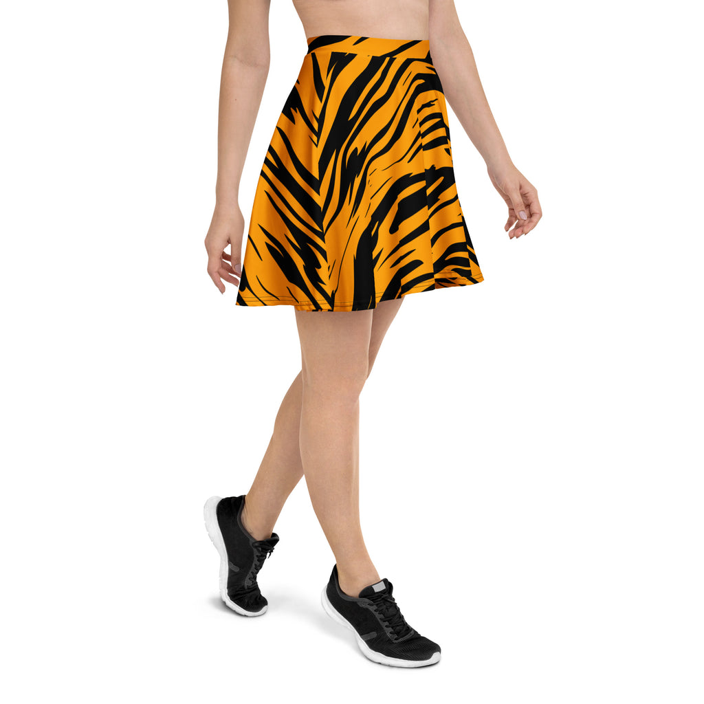A vibrant orange and black tiger print flared skater skirt with high waist flowy fabric and recycled material