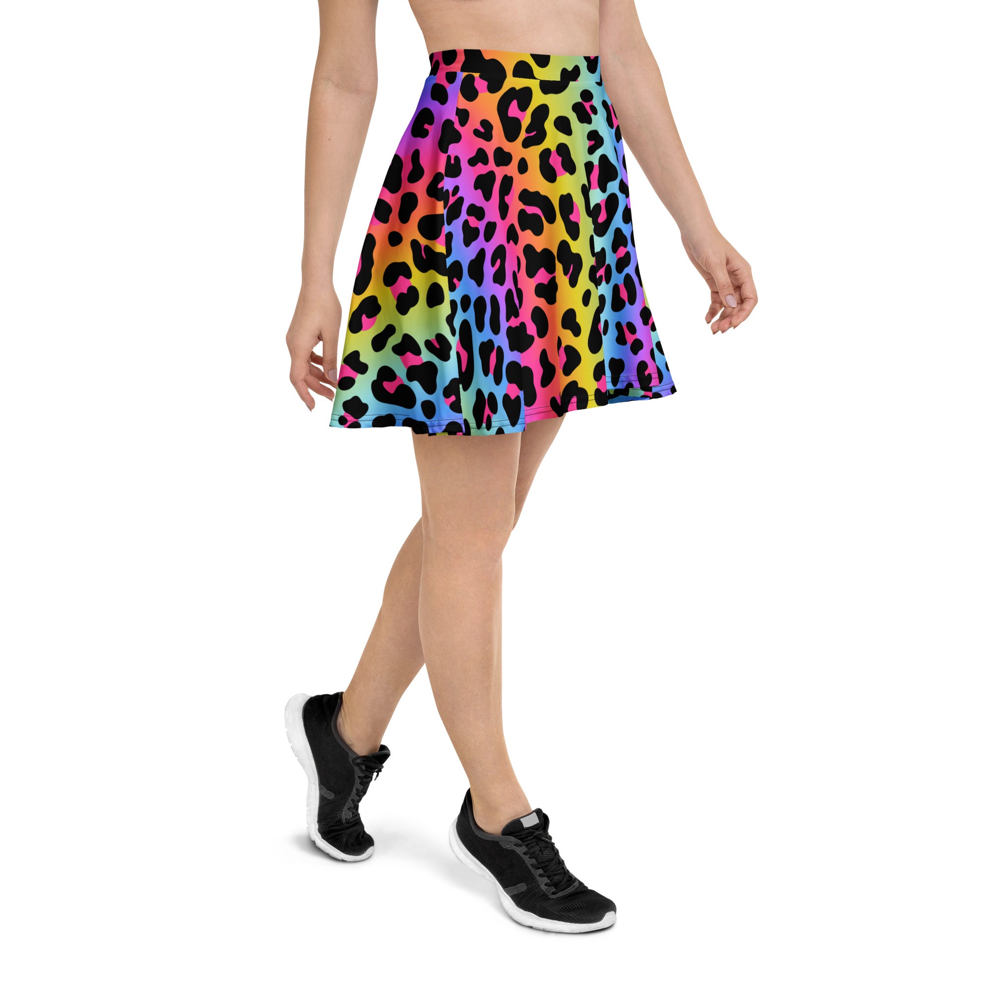 A vibrant rainbow-colored leopard print flared skater skirt high waisted with UPF 50 plus recycled fabric