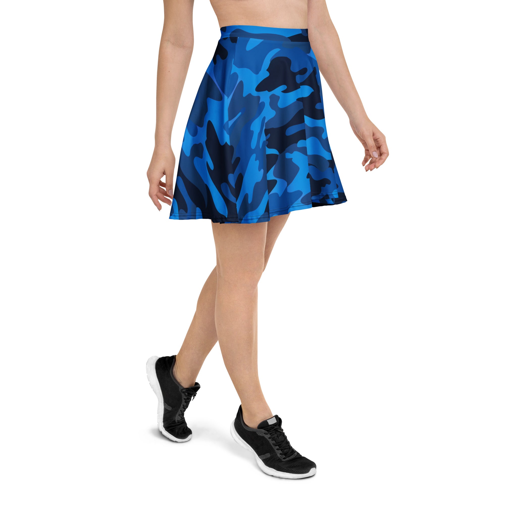 Women’s blue camouflage skater skirt with bold navy and bright blue pattern made from smooth stretchy recycled fabric