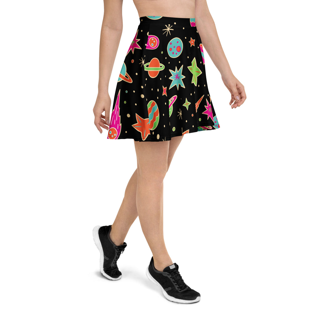 Women’s retro space skater skirt in black with colorful planets and stars print, flowy high waisted with UPF 50+ recycled fabric