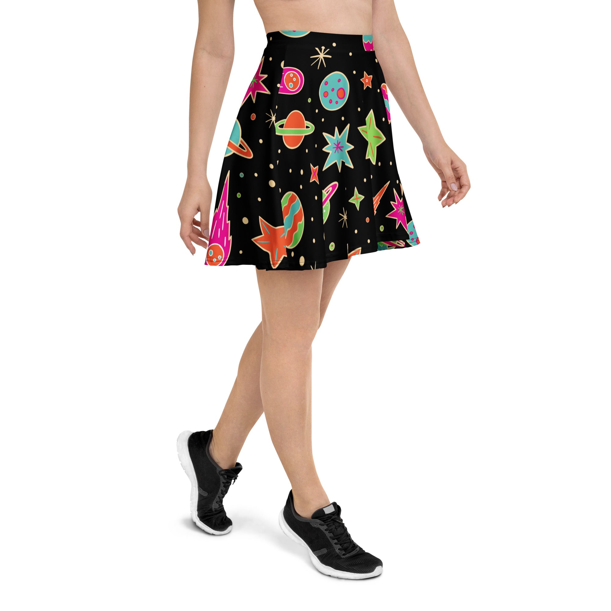 Women’s retro space skater skirt in black with colorful planets and stars print, flowy high waisted with UPF 50+ recycled fabric