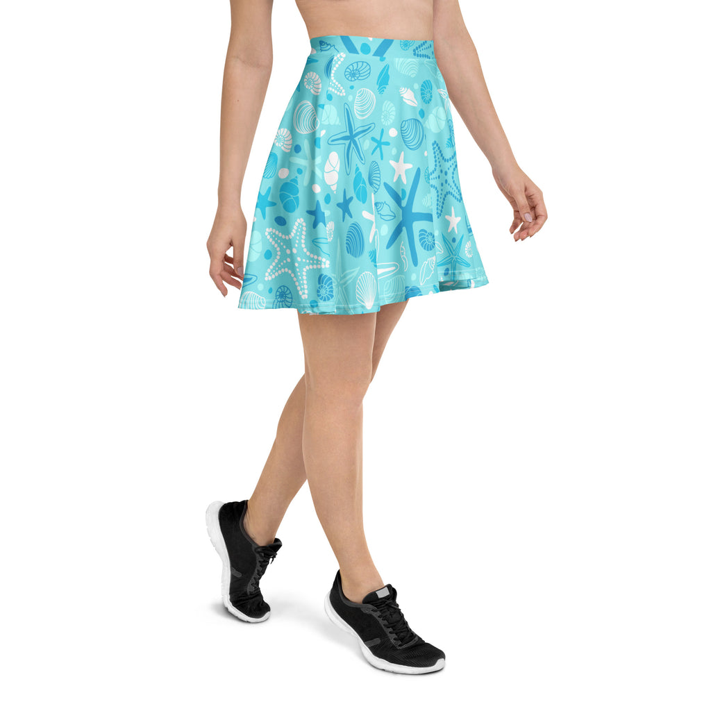 Women’s light blue pleated starfish and shells skater skirt with flowy high waist upf 50 plus and recycled fabric