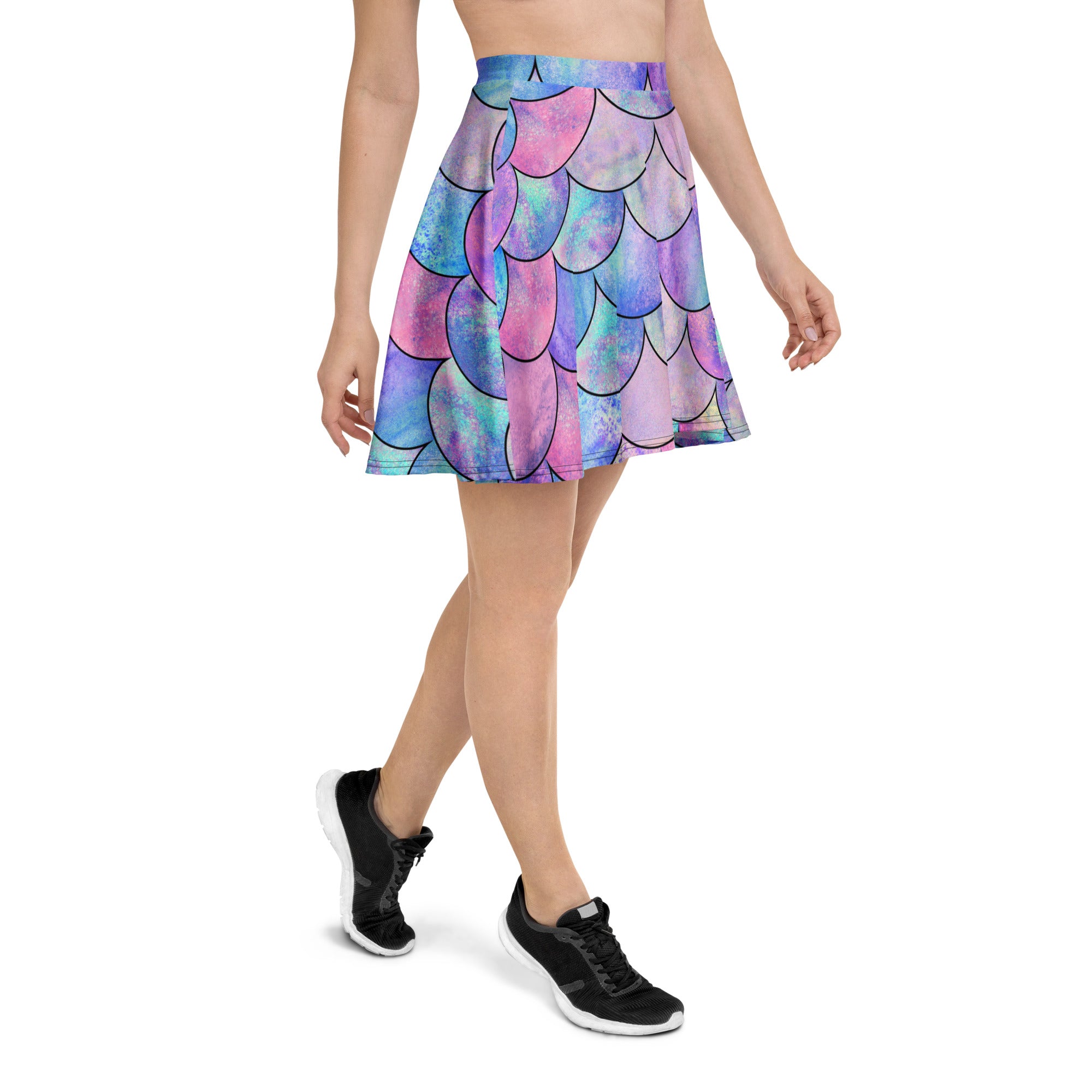 A vibrant high waisted pastel mermaid skater skirt with whimsical scale pattern made from recycled fabric with UPF 50+