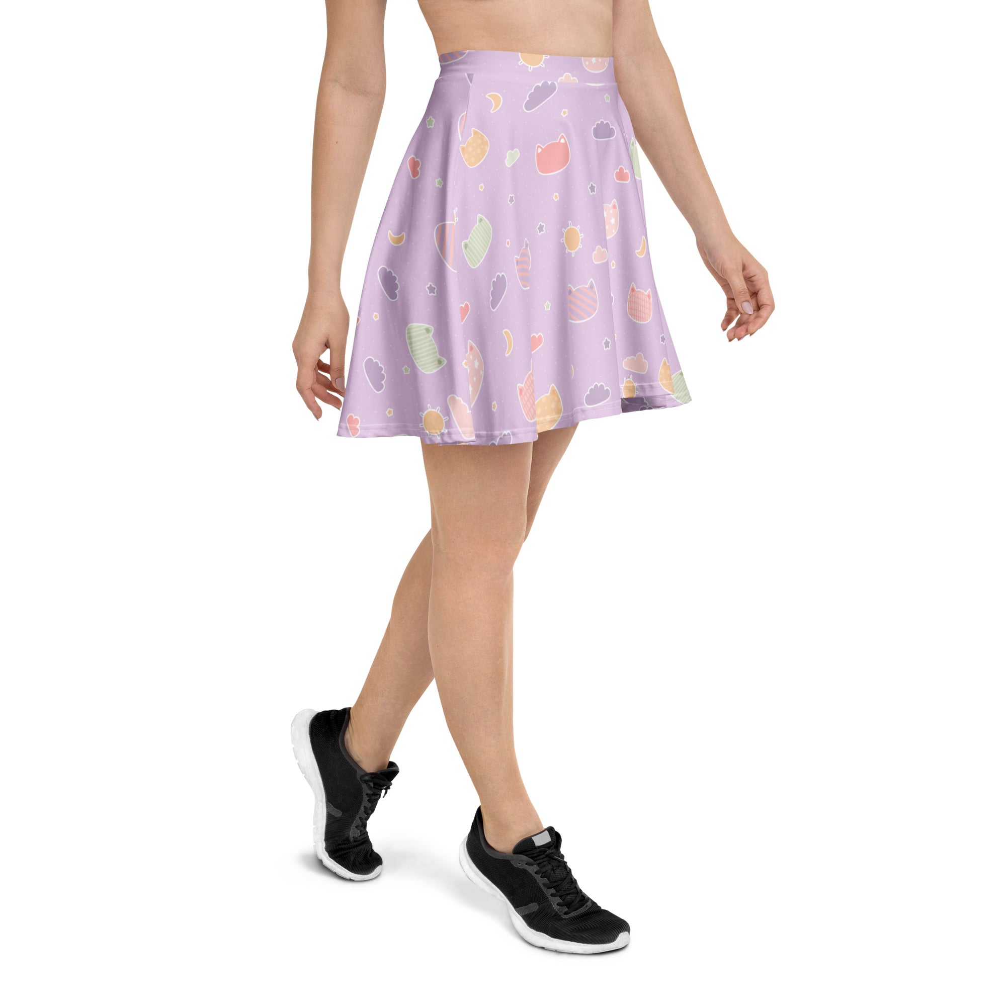 A lavender pleated skater skirt with pastel kawaii cat faces clouds pattern made from recycled fabric with upf 50+ protection