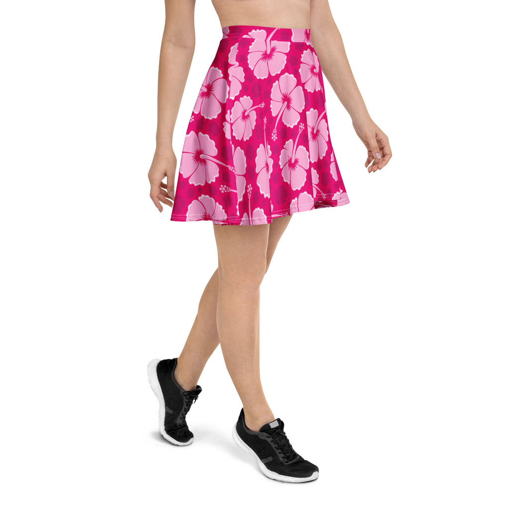A vibrant pink hibiscus skater skirt with high waisted flowy design made from recycled fabric with UPF 50 plus
