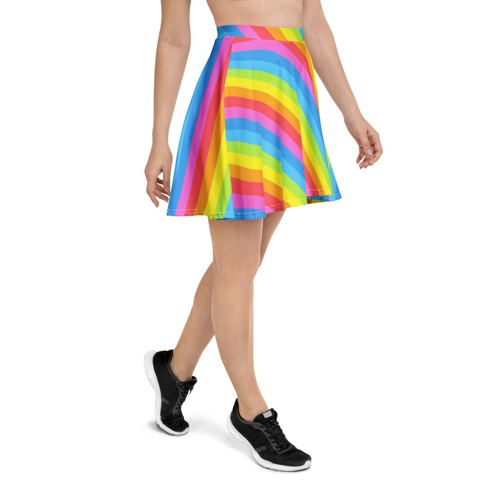 Women’s rainbow stripe skater skirt with vibrant diagonal pink yellow blue and green pleats in stretchy recycled fabric with UPF 50+