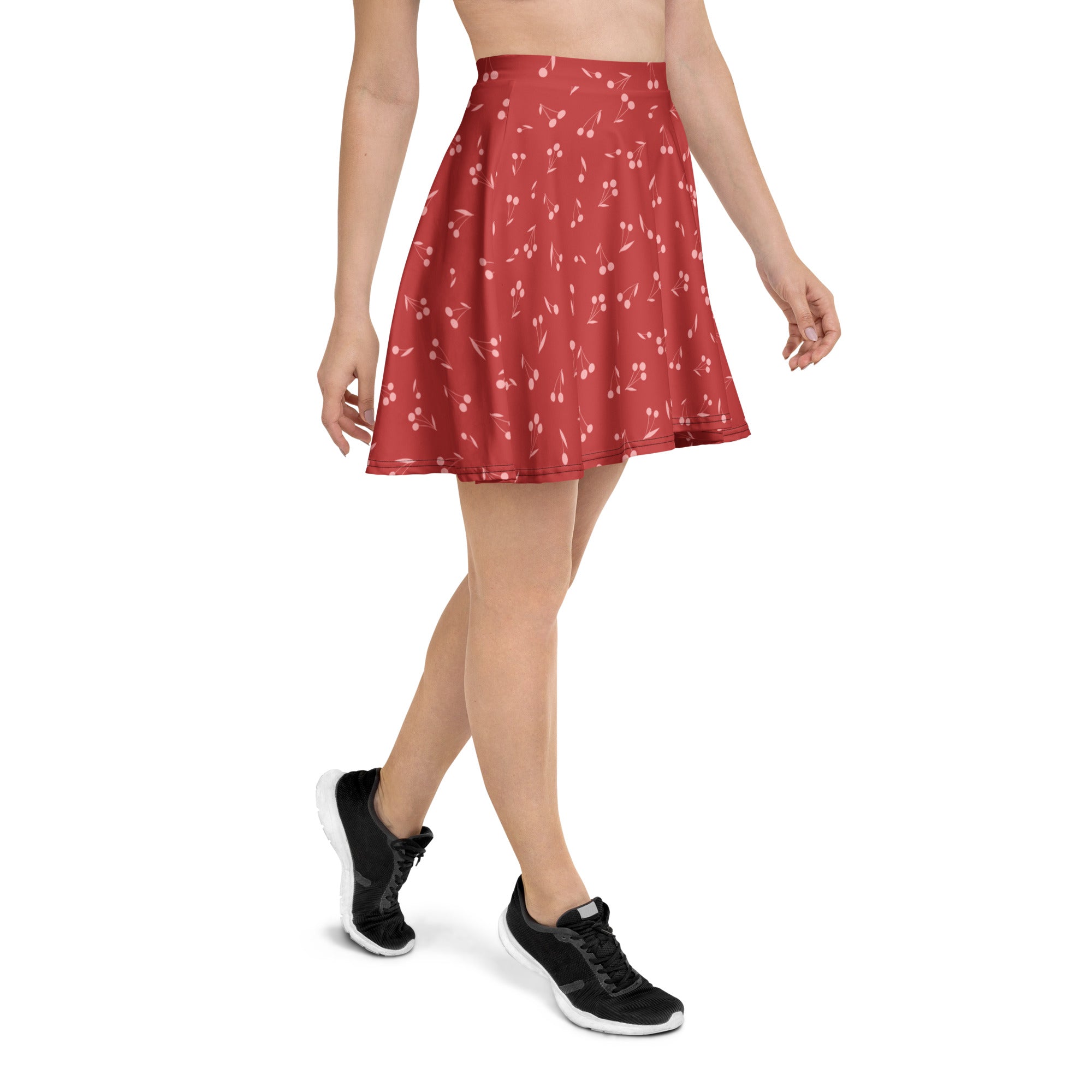 Women’s minimal cherry skater skirt in flared red recycled fabric with subtle cherry print and UPF 50 plus protection