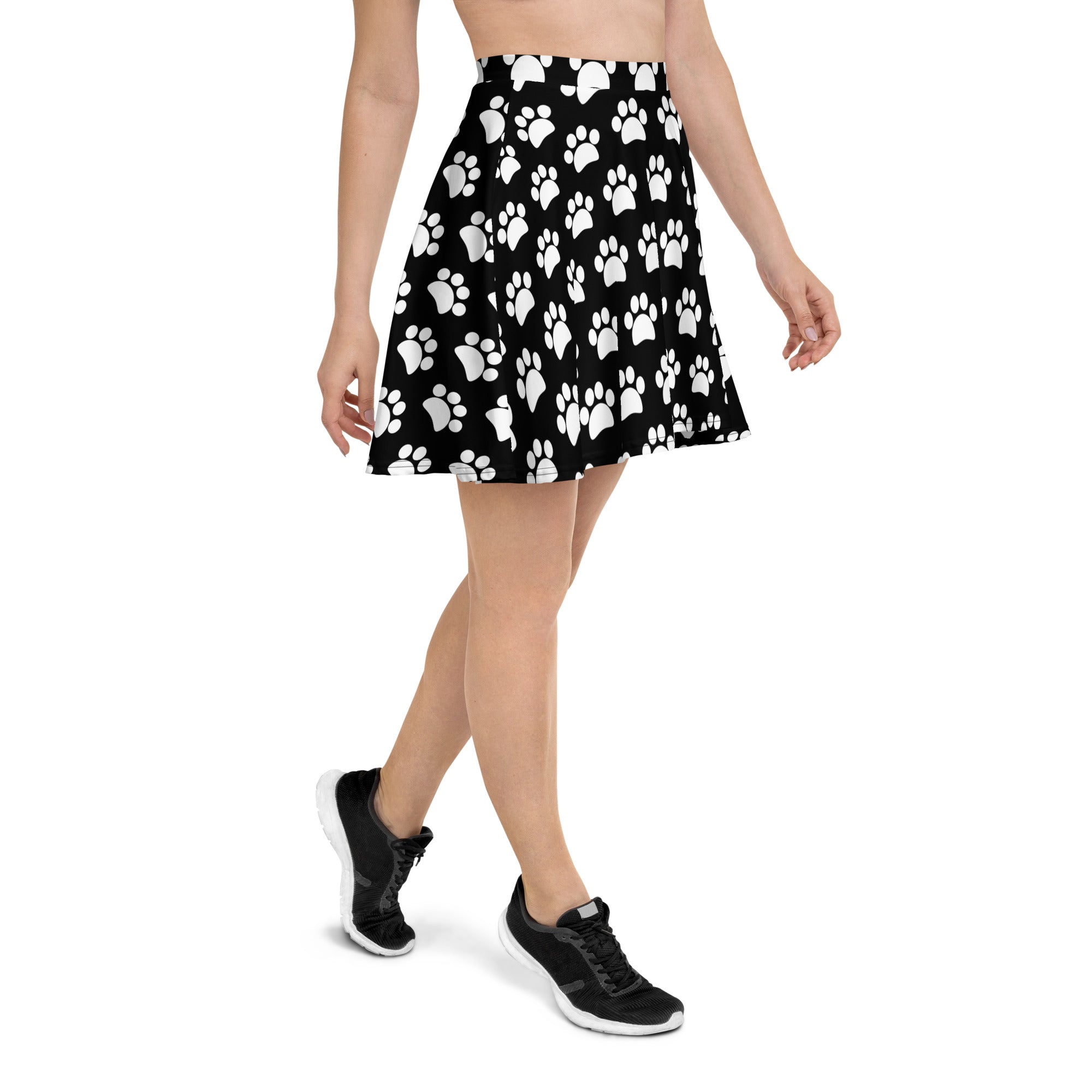 Women’s black pleated skater skirt with white paw prints flowy high waisted recycled fabric upf 50+