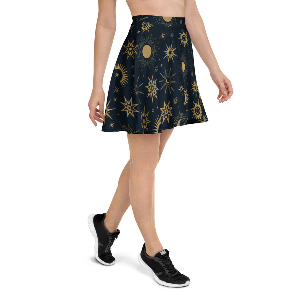 A navy blue women’s celestial sun and moon skater skirt with flowy high waist and recycled fabric with UPF 50+ protection