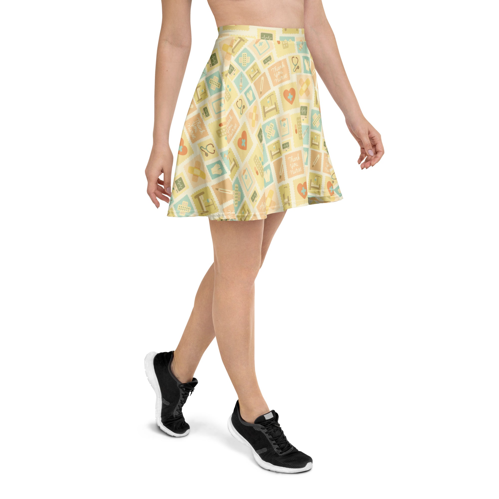 Women’s yellow nurse icon skater skirt with light blue vintage frame pattern, flowy high waisted with UPF 50+ recycled fabric