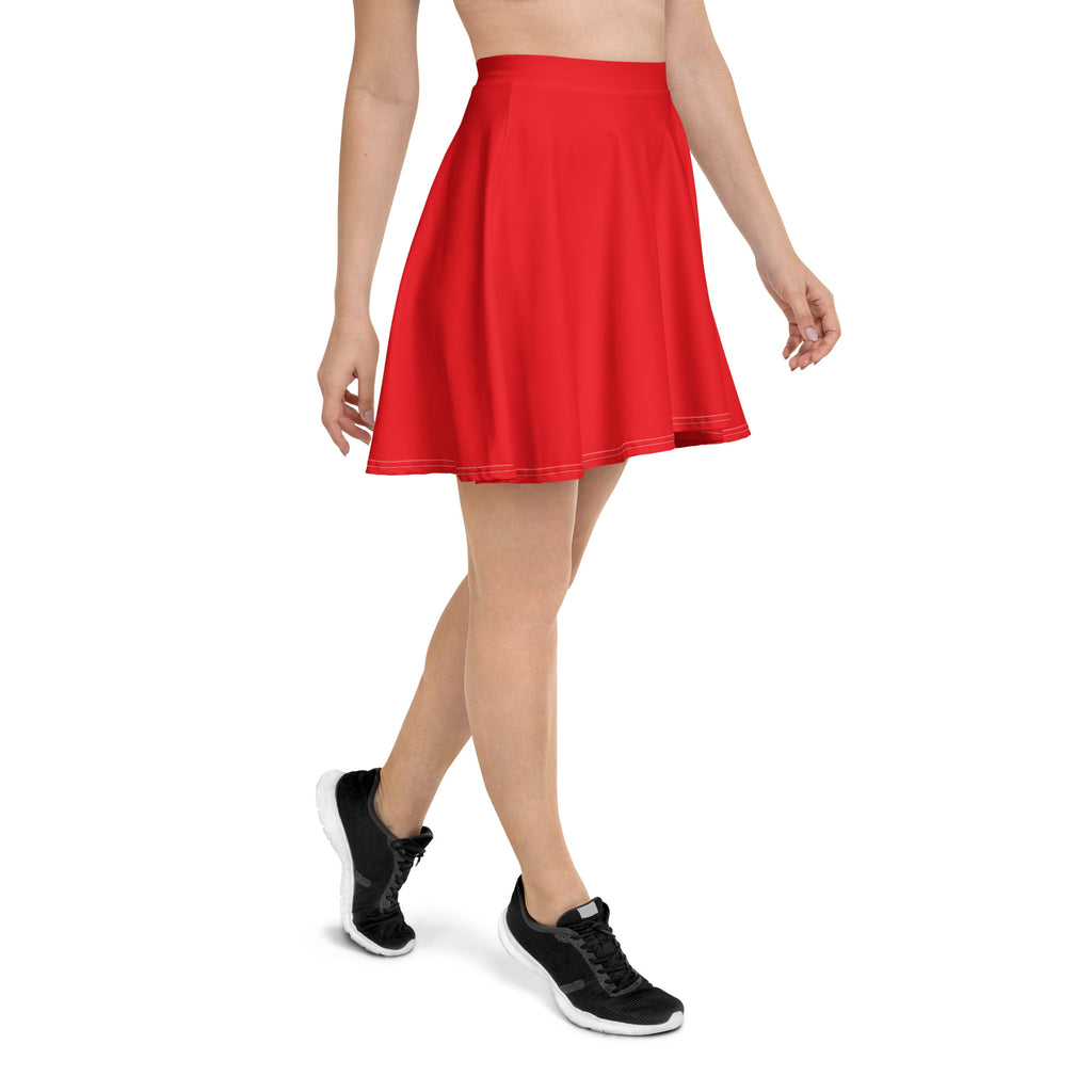 A vibrant red high waisted flared skirt made from recycled fabric with UPF 50 plus protection and smooth texture